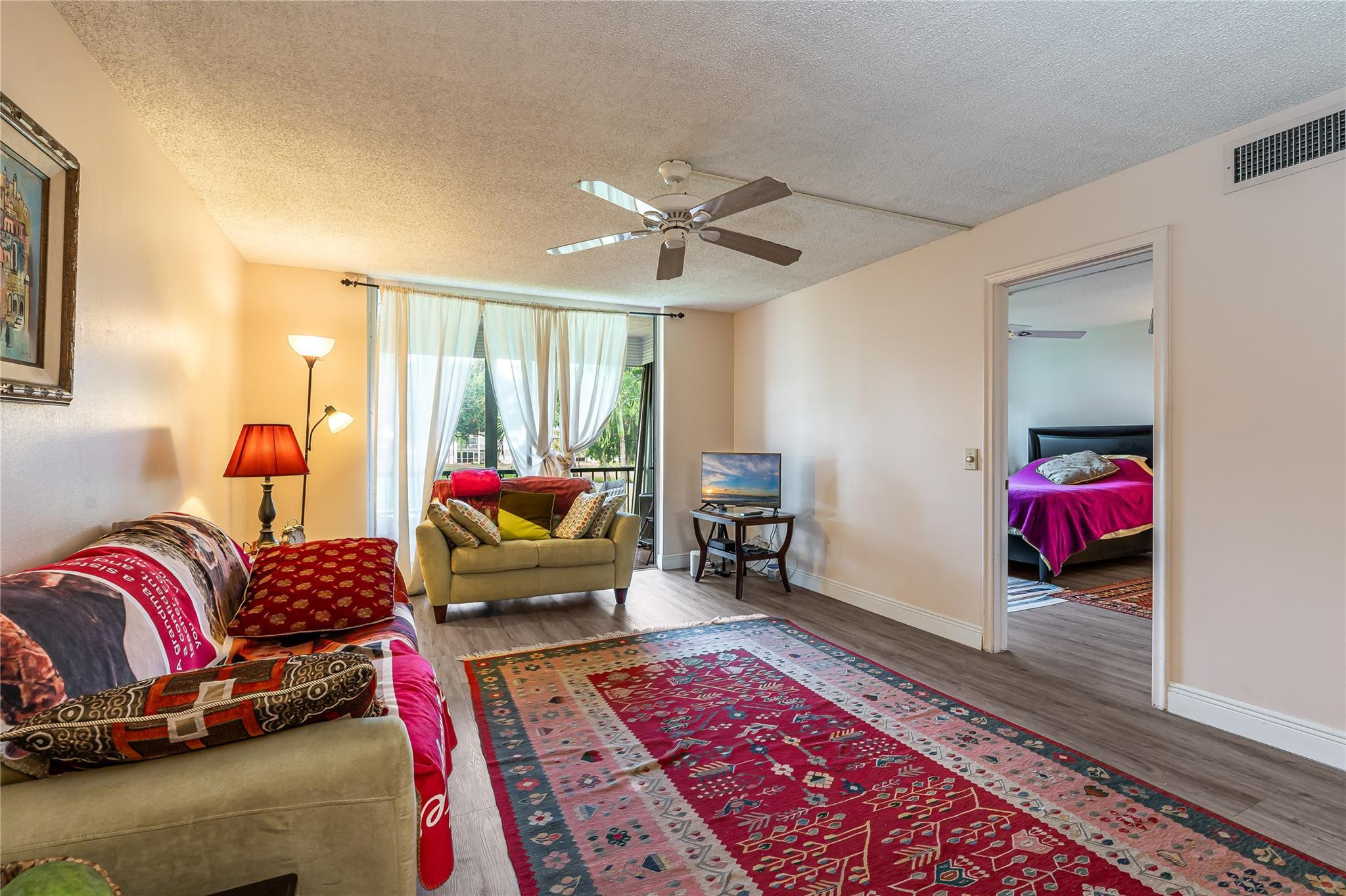 Enjoy BEAUTiFUL SUNSETS overlooking a large lake and the 7th and 18th holes on the Par 3 Golf Course. 2BR/2BA conveniently close to the B Gate. Newer bathroom vanities. Steps to pool and BBQ. Clean and move-in ready. FREE golf (except cart fees) on two 18 hole courses (PGA & Par3); Amenities include Restaurant, Billiard Room, Bbq/Picnic Area, Clubhouse, Courtesy Bus, Exercise Room, Heated Pool, Library, Putting Green, Sauna, Shuffleboard, Tennis, Pickle Ball, Vehicle Wash Area, Electric Car Charging Station. Close to shopping, dining & highways. 15 min. to beach. Association says 55+ age required; One of Hollybrook's best views!