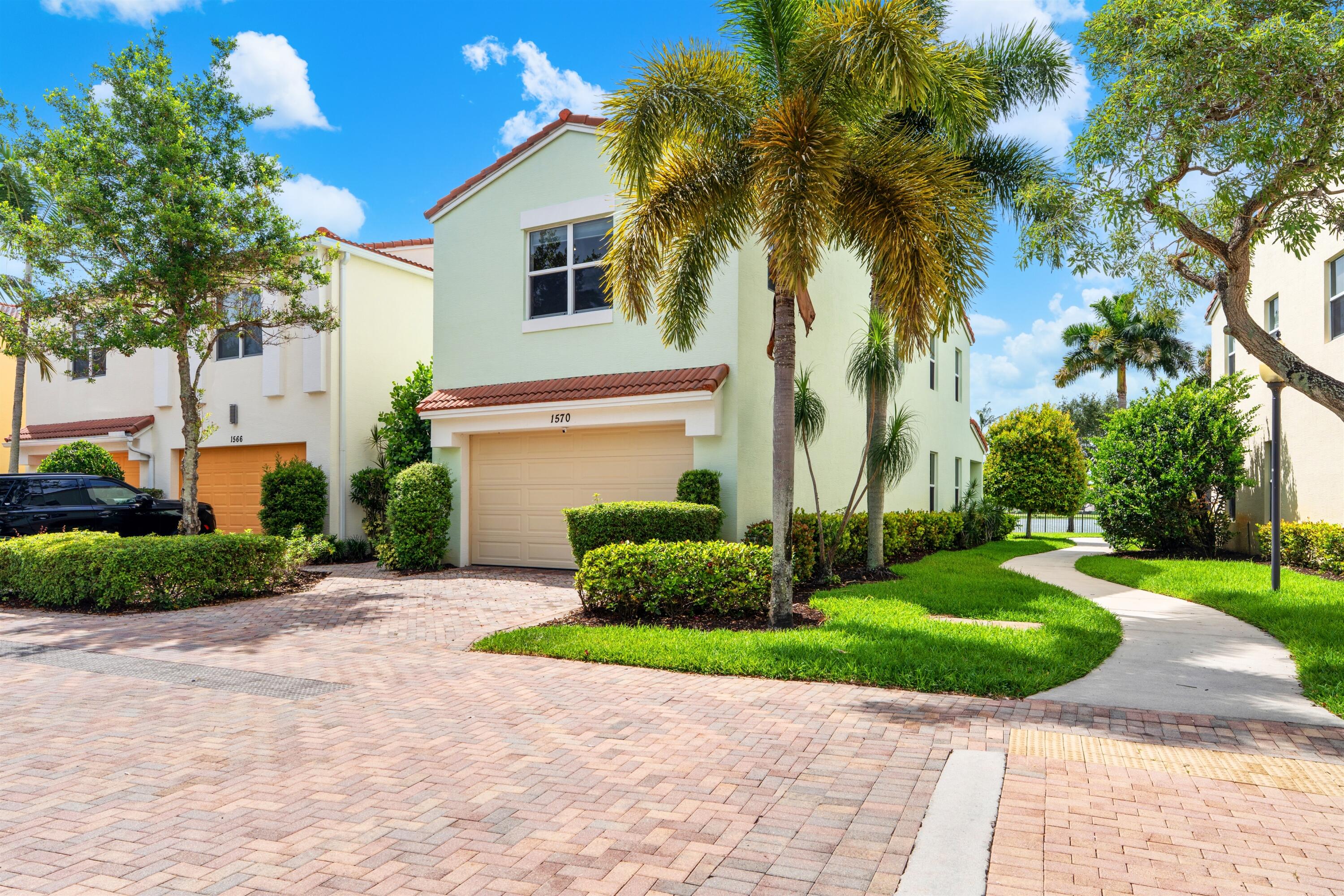 Set on a beautifully landscaped parcel, the covered loggia opens to green-carpeted lawn overlooking a breathtaking lake.  Meticulously renovated throughout, this chic end-unit townhome offers light-filled, spacious interiors in an open-concept plan that invites gracious yet relaxed lakeside living. With four bedrooms and 2,755± total square feet, brand-new enhancements include handsome moldings, rich porcelain tile and plush carpeted flooring, new lighting fixtures, a chandelier, ceiling fans, window treatments, screens and hardware. Opening via sliding doors to the covered loggia offering views of the lake, the great room adjoins the chef's kitchen, finished with Fabuwood extra-deep cabinetry, premium quartz countertops,  high-end Fisher & Paykel and GE Café appliances, a farmhouse sink, and an island accommodating seating, perfect for entertaining. The reconfigured second-floor layout comprises three guest bedrooms and lakeview primary bedroom suite, with a spa-like bathroom finished with Italian porcelain tile and fitted with double sinks, freestanding soaking tub and a glass-enclosed walk-in shower. Completing the overall layout are a powder room, second-floor laundry room, and  two-car garage with a new garage door opening system featuring Wi-Fi connectivity and an integrated camera.  Additional conveniences include a new HVAC system and air handler with transferable 12-year parts with a labor warranty and a Smart Wi Fi-enabled thermostat.  DISCLAIMER: Information published or otherwise provided by the listing company and its representatives including but not limited to prices, measurements, square footages, lot sizes, calculations, statistics, and videos are deemed reliable but are not guaranteed and are subject to errors, omissions or changes without notice. All such information should be independently verified by any prospective purchaser or seller. Parties should perform their own due diligence to verify such information prior to a sale or listing. Listing company expressly disclaims any warranty or representation regarding such information. Prices published are either list price, sold price, and/or last asking price. The listing company participates in the Multiple Listing Service and IDX. The properties published as listed and sold are not necessarily exclusive to listing company and may be listed or have sold with other members of the Multiple Listing Service. Transactions where listing company represented both buyers and sellers are calculated as two sales. "No payments made until title passes" Some affiliations may not be applicable to certain geographic areas. If your property is currently listed with another broker, please disregard any solicitation for services. Information published or otherwise provided by seller, listing company or its representatives is deemed reliable but are not guaranteed and subject to errors, omissions, or changes without notice. Copyright 2026 by the listing company. All Rights Reserved.