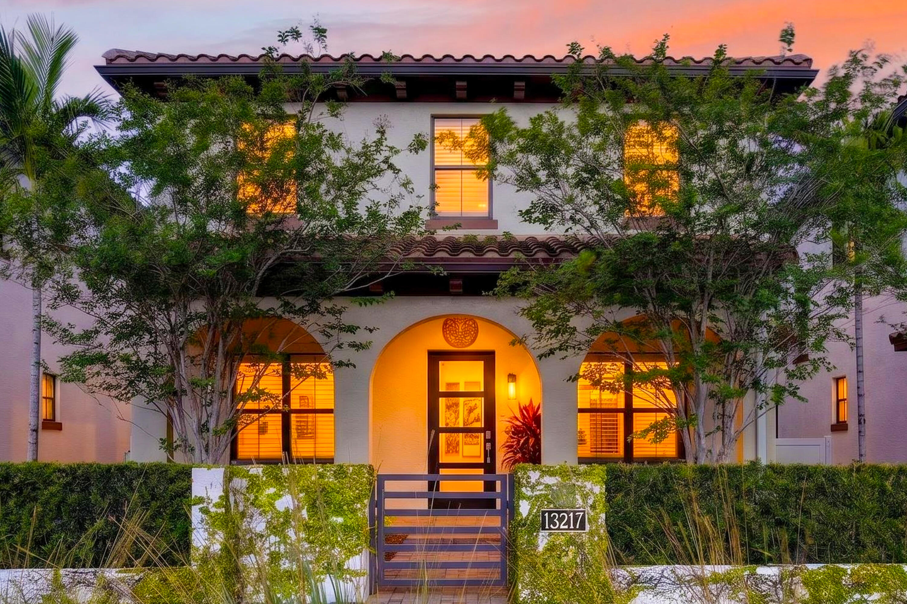 This stunning 5BR/4BA designer-appointed home with a private pool and nearly 4,000 square feet offers an exceptional rental opportunity in the heart of the Alton community. This 2021-built residence delivers refined living with approximately 3,996 square feet of thoughtfully designed space. Featuring beautiful designer finishes, an open floor plan, and abundant natural light, the home boasts a show-stopping gourmet kitchen with a massive center island, gleaming quartz countertops, high-end stainless steel appliances, custom white cabinetry, and elegant brass fixtures. Additional highlights include spacious living areas, a private pool visible from the dining room, beautifully appointed bedrooms, a custom built office, a 3-car garage, whole-home water filtration system, and an outdoor shower. The expansive outdoor entertainment patio creates the perfect setting for al fresco dining, relaxing by the sparkling pool, and enjoying Florida's beautiful weather.  Located in the highly sought-after Alton community, this home is steps to the community clubhouse and Alton Town Center. Residents enjoy effortless access to an outstanding resort-style lifestyle with amenities including a clubhouse with resort-style pool, state-of-the-art fitness center, pickleball courts, dog parks, playgrounds, and beautiful green spaces, while the home sits only minutes from the beaches, world-class golf courses, downtown Palm Beach, and Palm Beach International Airport.  Whether you're looking for a luxurious family home or an upscale seasonal retreat, this property provides modern comfort, privacy, and the complete Alton lifestyle.