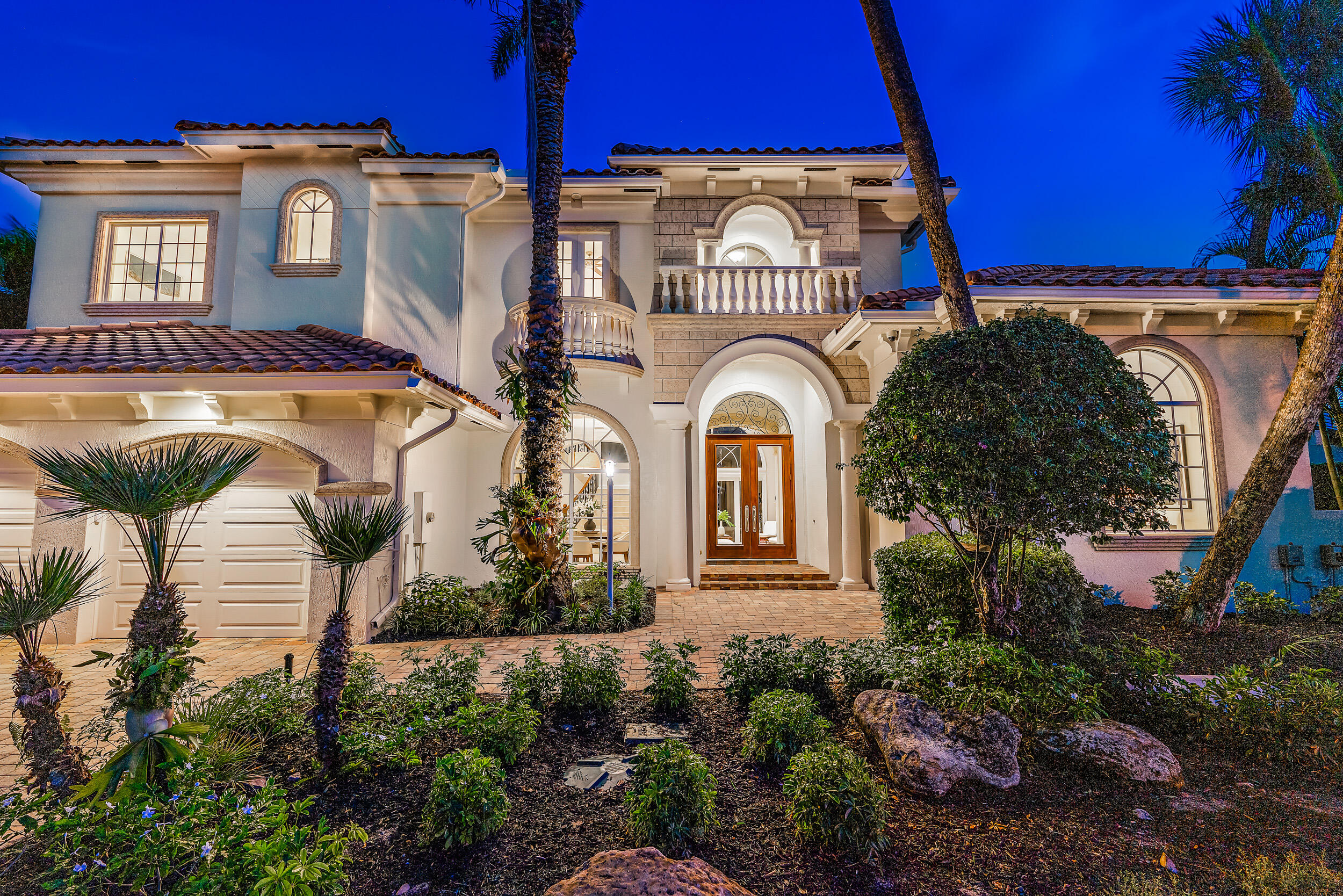 This waterfront home is a Florida dream come true.  The water access is unparalleled with 115 feet of deep water dockage, no fixed bridges, you will be out of the inlet in less than 5 minutes, AND it includes deeded beach access with the perfect neighborhood private beach clubhouse.  You will find a spacious floorplan including five bedrooms and four full baths plus a half bath.   The downstairs master bedroom has a spacious sitting area,  his and hers walk in closets, and a fully appointed master bathroom.  This home is perfect for entertaining with a formal dining room and tons of outdoor space.  Enjoy hosting or tremendous privacy in the stunning space.  The upstairs loggia is the perfect place to enjoy the spectacular Florida sunsets.  Welcome to paradise.