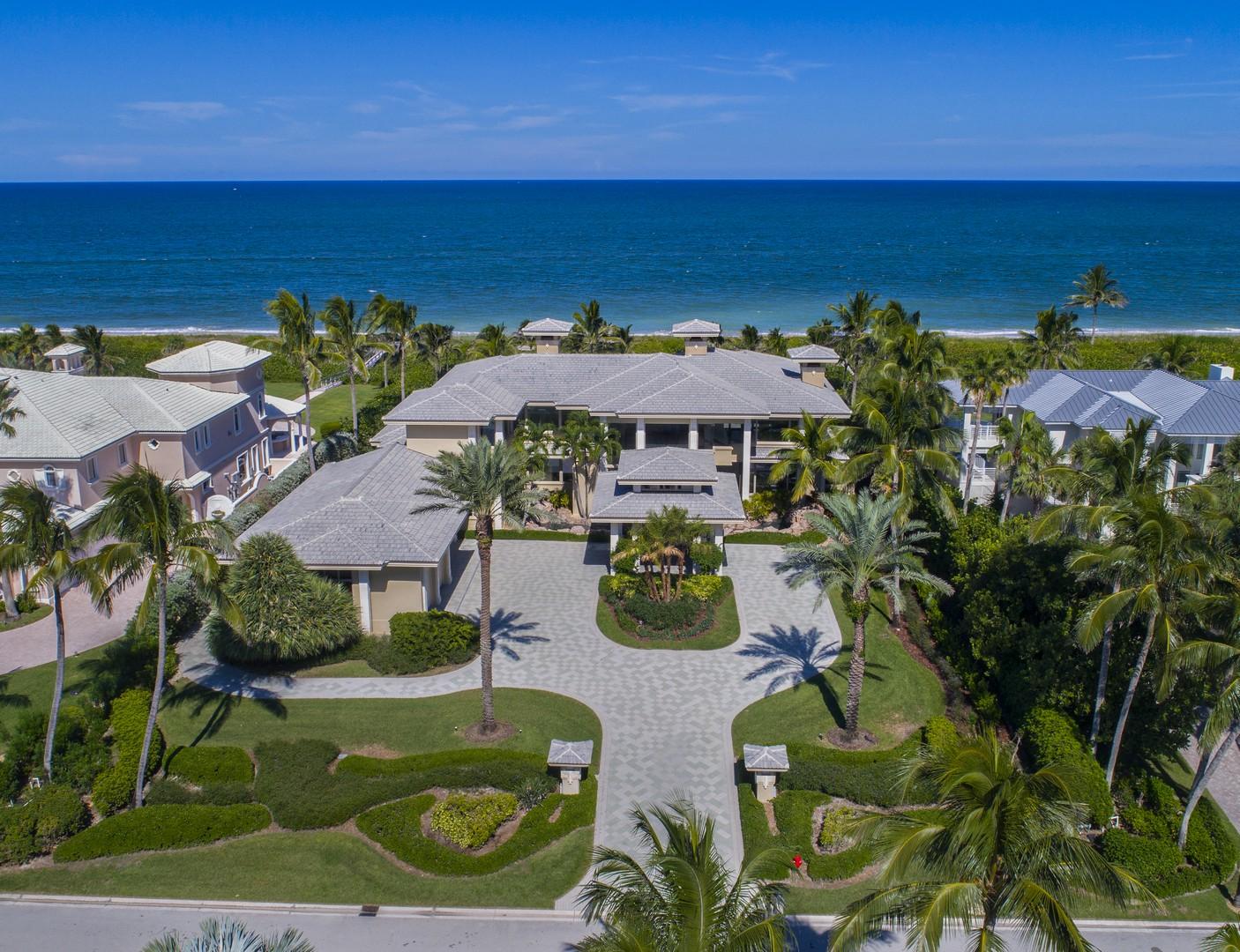 Contemporary residence with 140 ft of ocean frontage.  Seascapes available from all main areas of house & bedroom suites.  Teak wood, Saturnia marble, slate and Coquina stone are featured throughout the residence. Living room has dynamic teak coffered ceiling, floor to ceiling Coquina stone fireplace and full bar.  Chef's kitchen opens to morning room/family area. Second level master suite has ocean & inlet views. Three en suite guest rooms and an en suite study complete the accommodations. Outdoors a pool complex features a raised spa cascading into a half moon pool with vanishing edge.  Entertaining will be a joy from the covered patio and outdoor kitchen. Then take a leisurely stroll on the private dune walk with built-in seating.