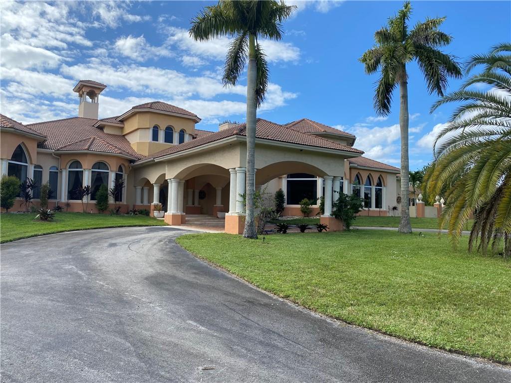 MASTERPIECE NESTLED ON 3.84 ACRES **PLUS** A SEPARATE BUT CONTIGUOUS PARCEL IS AVAILABLE FOR A TOTAL OF 6+ ACRES FOR SEPARATE PURCHASE. THE ONLY PROPERTY OF THIS SIZE ON THE MARKET IN WESTON!  THIS 21,848 SF+ PALACE FEATURES LUXURY FINISHES: A GRAND 400 CAPACITY BALLROOM; 26 X 20 HOME THEATER; IMPACT WINDOWS; IMPORTED CUSTOM DOORS FROM SPAIN; FULL-SERVICE INTERIOR BAR WITH FIREPLACE; EXERCISE ROOM; CONTEMPORARY KITCHEN WITH HIGH END FINISHES AND APPLIANCES. LONG MAJESTIC HALLWAY; IMPRESSIVE CHANDELIERS; AN ENTERTAINER'S PARADISE. RESORT STYLE 60 X 30 POOL WITH SWIM-UP BAR. FULL SUMMER KITCHEN; SPA WITH BUILT IN BBQ HALF BATHROOM AND OUTDOOR SHOWER. THIS BREATH TAKING CUSTOM BUILT MAJESTIC MANSION INCLUDES  6 BEDROOMS AND 9 BATHROOMS PLUS HELPERS QUARTERS. MARBLE & WOOD FLOOR. DEVELOPERS DREAM...MASTERPIECE NESTLED ON 3.84 ACRES **PLUS** A SEPARATE BUT CONTIGUOUS PARCEL IS AVAILABLE FOR SEPARATE PURCHASE FOR A TOTAL OF 6+ ACRES. THE ONLY PROPERTY OF THIS SIZE ON THE MARKET IN WESTON!  THIS 21,848 SF+ PALACE FEATURES LUXURY FINISHES: A GRAND 400 CAPACITY BALLROOM; 26 X 20 HOME THEATER; IMPACT WINDOWS; IMPORTED CUSTOM DOORS FROM SPAIN; FULL-SERVICE INTERIOR BAR WITH FIREPLACE; EXERCISE ROOM; CONTEMPORARY KITCHEN WITH HIGH END FINISHES AND APPLIANCES. LONG MAJESTIC HALLWAY; IMPRESSIVE CHANDELIERS; AN ENTERTAINER'S PARADISE. RESORT STYLE 60 X 30 POOL WITH SWIM-UP BAR. FULL SUMMER KITCHEN; SPA WITH BUILT IN BBQ HALF BATHROOM AND OUTDOOR SHOWER. THIS BREATH TAKING CUSTOM BUILT MAJESTIC MANSION INCLUDES  6 BEDROOMS AND 9 BATHROOMS PLUS HELPERS QUARTERS. MARBLE & WOOD FLOORS; ELEGANT FOYER ENTRANCE; LUXURIOUS MASTER BEDROOM SUITE, WITH SITTING AREA; WET BAR AND SEPARATE HIS & HER BATHROOMS AND VERY LARGE WALK IN CLOSETS. GREAT ROOM WITH WOOD FLOOR AND CENTER AREA BAR; OFFICES WITH MEETING ROOM AND HALF BATHROOM; FORMAL DINING ROOM WITH WINE CELLAR ADJOINING; ELEGANT FORMAL LIVING ROOM ADJOINING A RELAXING BAR & SITTING AREA WITH FIREPLACE LEADING OUT TO WRAP AROUND BALCONY AROUND THE TOTAL BACK AREA.