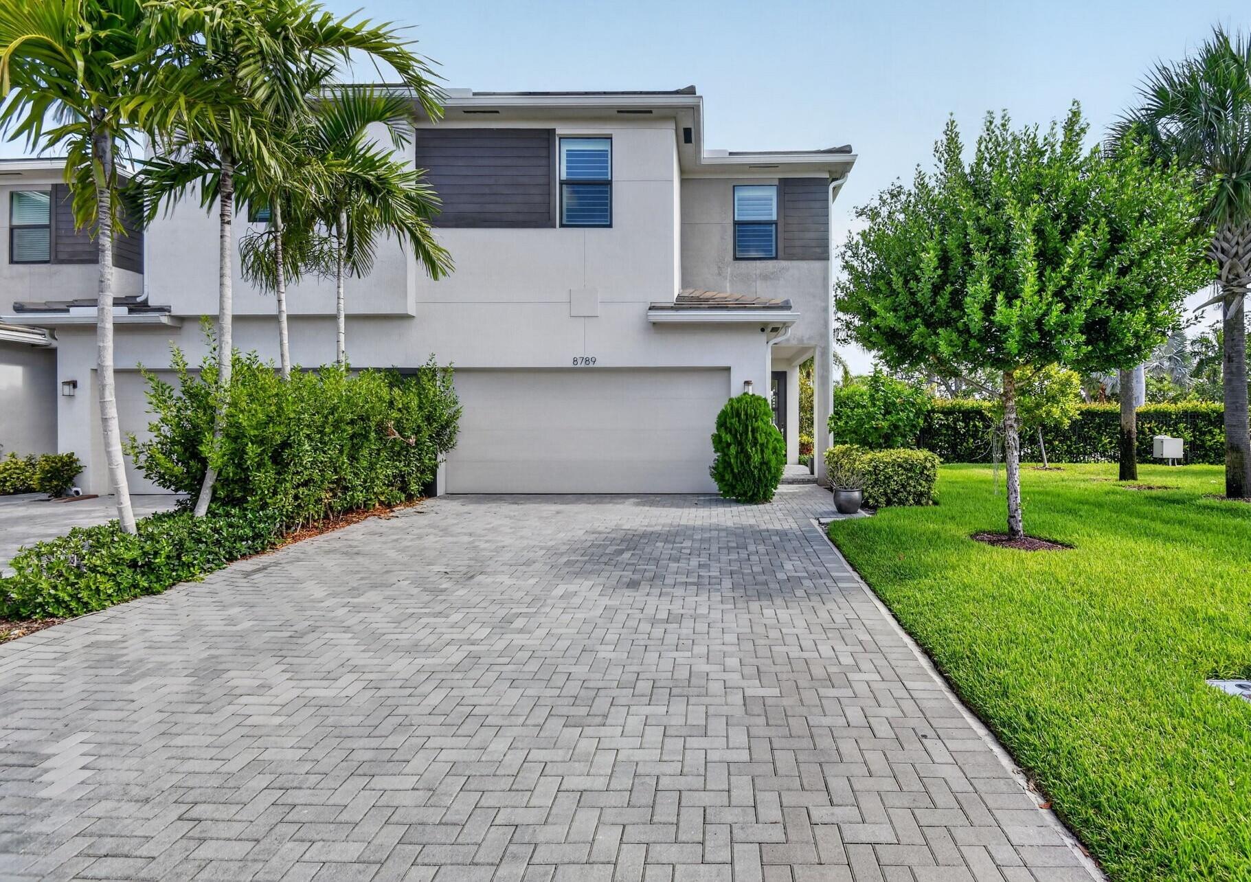 Welcome to your vibrant new lifestyle at Saddlewood at Polo Legacy! Nestled off Lake Worth Road, this pristine 2022 built end-unit townhome perfectly balances quiet luxury with easy access to the Turnpike, top schools, and dining. Inside, natural light floods a space that feels like a designer model. Imagine hosting friends in your private, fenced backyard, or cooking in a chef's kitchen featuring a quartz island, 42" cabinets, and stainless appliances. Modern upgrades include Nest tech, plantation shutters, and elegant molding. The seamless layout offers a downstairs half-bath, three serene upstairs bedrooms, and two full baths. Enjoy a secure, gated community with low HOAs and a sparkling resort-style pool. Schedule your private tour today!