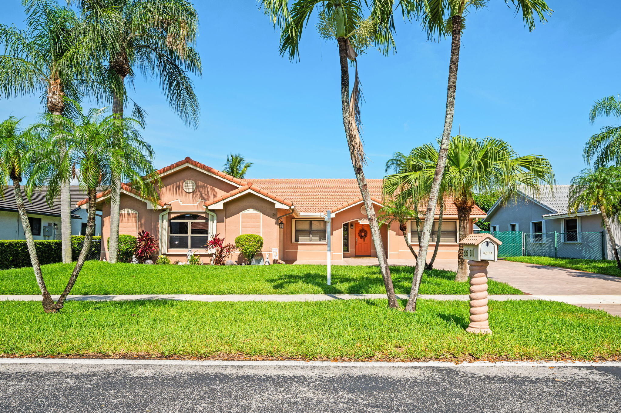 Perfect quiet location, large screened patio, salt water heated pool, fenced yard, all overlooking serene lake view. 8 car stamped concrete driveway, 2 sheds, new AC, stove and oven.  Cozy former model home, upgraded guest bath plus lots of upgrades. Low development maintenance fee paid yearly for common areas.