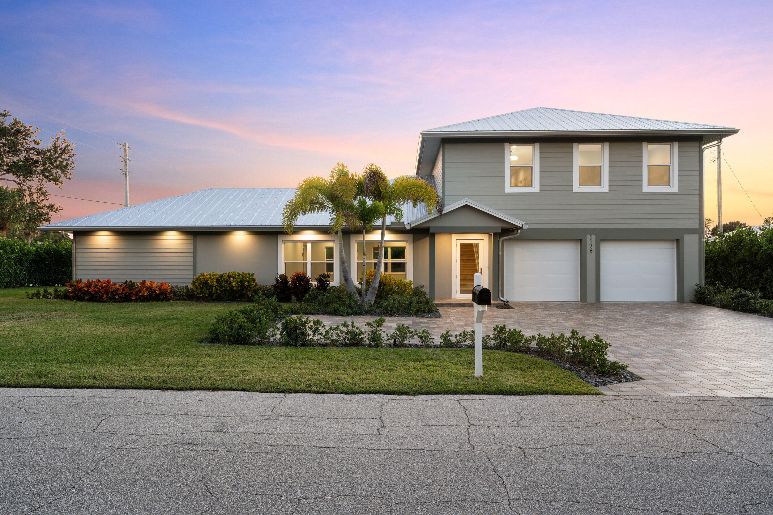 Come see this beautiful brand-new construction home in the heart of Jensen Beach. Designed with quality and efficiency in mind, this home features impact doors and windows, mill-finish aluminum gutters, professionally landscaped grounds, an ultra-high-efficiency AC system, and a heat-pump hot water heater. The chef's kitchen and custom cabinetry throughout the home add both style and function. A versatile loft area offers flexible space for a home office, media room, or guest retreat. Conveniently located just minutes from downtown Jensen Beach, shopping, dining, and pristine beaches. An excellent opportunity as a family home, vacation retreat, or income-producing Airbnb.