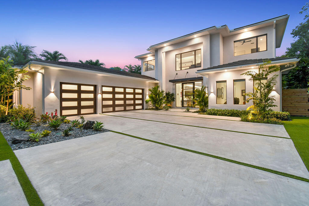 Gorgeous, newer construction, private waterfront property with 80 feet of waterfront adjacent to the Intracoastal Waterway on just under a half of an acre at the end of a private tree-lined road. Boater's dream with deep-water, private dock, with lift, ocean access & no fixed bridges. Home features 4,697 square feet of living space and 6,497 square feet total, with four bedrooms, five and one-half bathrooms, exercise room and office. As you enter the home you are instantly greeted with stunning water views that can be seen from every angle of the spacious great room. Large chef's kitchen with state-of-the-art appliances and marble countertops. Wet bar complete with wine storage and the best ice in town. Covered loggia with summer kitchen and retractable screens. Expansive primary master suite with exceptional views and extensive closet space. No expense was spared on the construction of this immaculate residence. High end landscape and lighting, turf, and a phenomenal saltwater heated pool equipped with a sun-shelf, jacuzzi, heated and soaking chairs. Perfect use of space found throughout with a large great room, laundry up and downstairs, cabana bath, oversized garage with epoxy floors, luxury bar, loft, covered outdoor dining and summer kitchen. 
Centrally located on S Shore Dr, with a scenic oak tree lined entry surrounded by waterfront residences, with ease of access to Juno Beach, Malls, Outdoor Dining, Shopping, 95 and more.
This jaw dropping newer build is a must see!