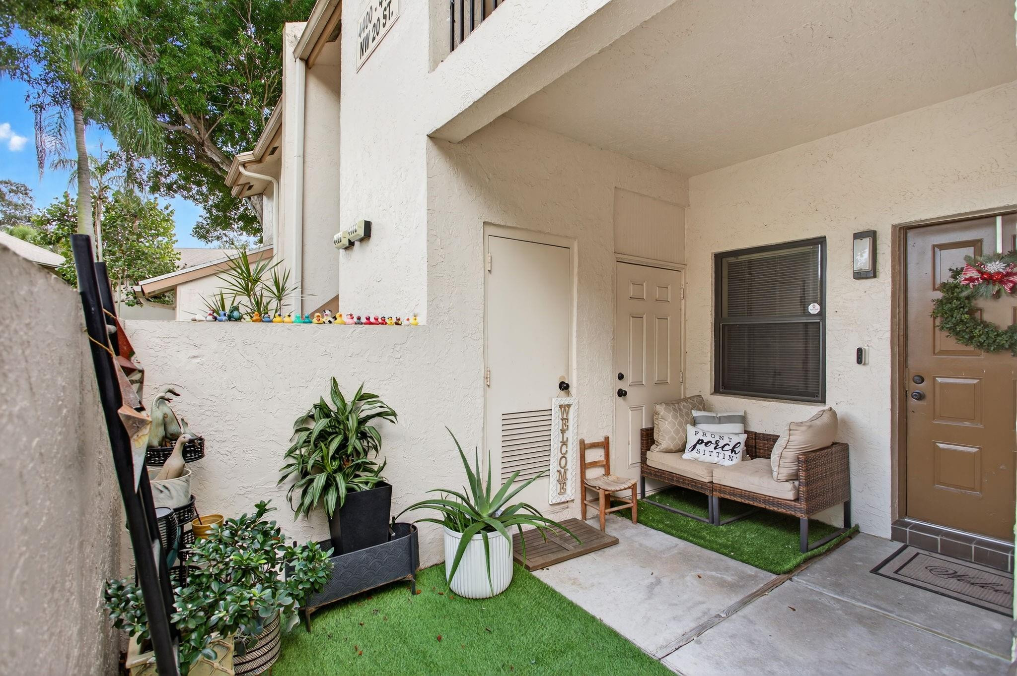 Beautiful & spacious FIRST FLOOR- 2 bed, 2 bath home blends modern elegance with comfortable living. This open-concept design boasts tile floors throughout, new wood tile in the bedrooms, and stylishly updated bathrooms. Hurricane impact windows throughout(excluding the front door and sliders). Enjoy the convenience of an in-unit washer and dryer. Situated in a desirable neighborhood at an amazing price, this corner unit is tucked away on a quiet street. The area is peaceful and family-friendly, with playgrounds nearby, and just 2 miles from the Coconut Creek Promenade. Move-in ready and waiting to be your new home—don’t miss out, schedule your showing today! All ages welcome.