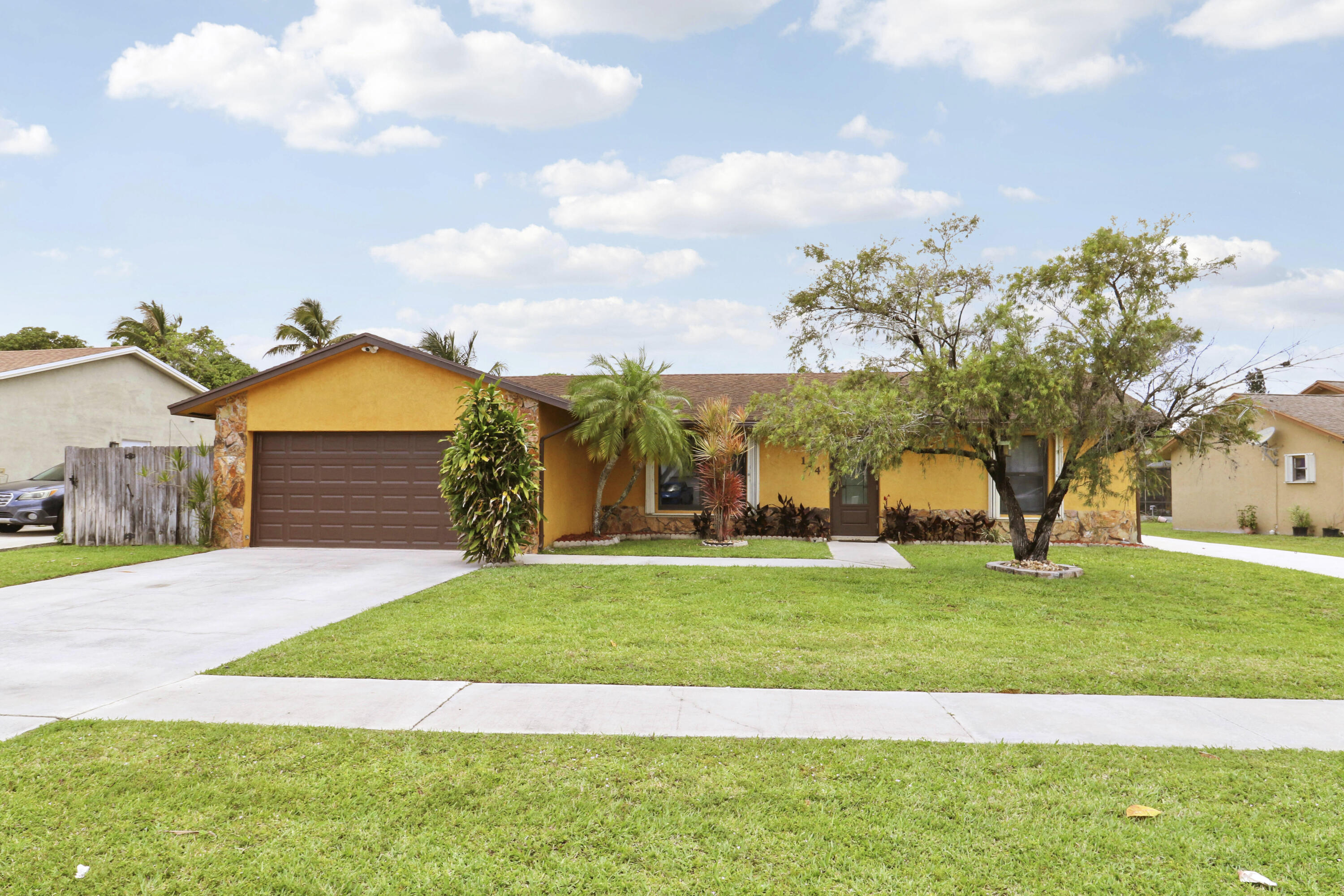 Canal front CBS-constructed home with all NEW complete set of impact glass windows and sliders! Located in the popular no-HOA neighborhood of La Mancha, featuring a Split plan, a large family room with vaulted ceilings, and a primary suite with ensuite and walk-in closet. Brand NEW water heater 2026, Fully fenced backyard with peaceful canal views and plenty of room to add a pool. The irrigation system (with a new pump) is fed from canal providing lower lower water bills. Separate laundry room with washer and dryer that stay with the home at closing. Additional boat / RV Parking pad/driveway on the right side of the home includes electrical/plumbing..