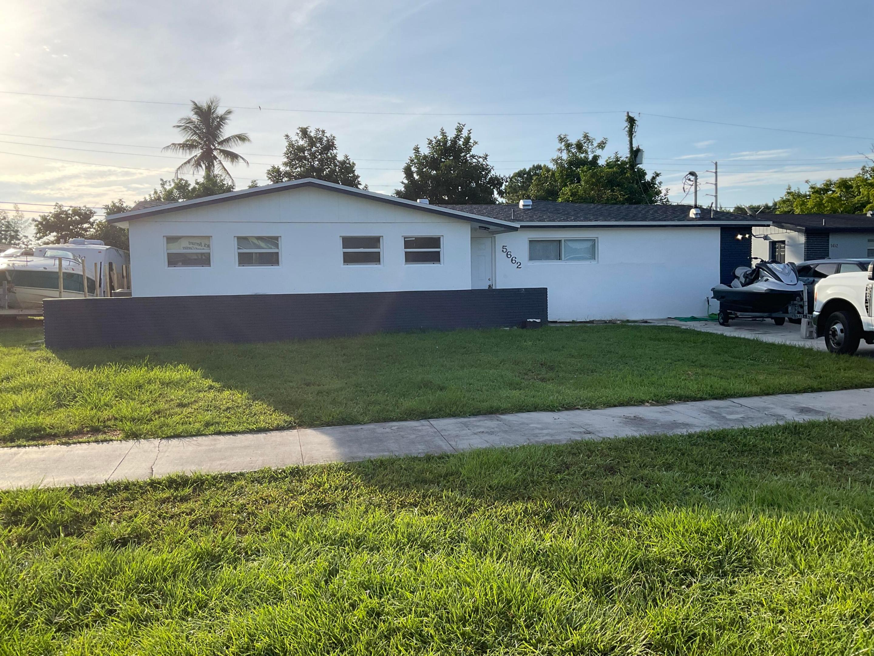 TOTALLY REMODELED AND WELL-MAINTAINED 3-BEDROOM, 2-BATH HOME LOCATED IN THE HEART OF WEST PALM BEACH, DIRECTLY ACROSS FROM MARK BERNARD PARK. THIS BEAUTIFUL HOME FEATURES LAMINATE FLOORING THROUGHOUT, A BRAND-NEW A/C SYSTEM, A FULLY UPDATED KITCHEN WITH QUARTZ COUNTERTOPS, AND NEW STAINLESS-STEEL APPLIANCES. FOR ADDED CONVENIENCE, A WASHER AND DRYER ARE INCLUDED. RENT INCLUDES WATER, ELECTRICITY, AND GAS. HOME IS AVAILABLE FOR IMMEDIATE OCCUPANCY. DON'T MISS THIS WONDERFUL RENTAL OPPORTUNITY IN A PRIME LOCATION! PLEASE NOTE: THIS RENTAL IS FOR THE FRONT UNIT ONLY. THE ATTACHED ADDITION LOCATED AT THE REAR OF THE PROPERTY IS NOT INCLUDED IN THE LEASE.