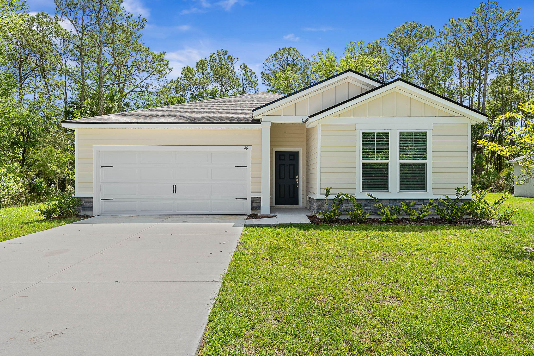 Step into that "brand new" feeling at 46 Poplar Dr in Palm Coast. Never lived in and completely move-in ready. From the moment you walk through the door, you'll notice the fresh finishes, modern design, and clean slate waiting for your personal touch.  Situated on an exceptional lot in Palm Coast's desirable P Section, this 3 bed plus Den offers a rare sense of privacy, perfect for relaxing, entertaining, or simply enjoying your own space without compromise. With no HOA and no restrictions, you have the freedom to truly make this home your own.  Conveniently located near shopping, dining, schools, and just a short drive to the beach, this home combines peaceful living with everyday accessibility. Roof 2025, AC 2025, Water Heater 2025, Everything brand new 2025 never been used before.