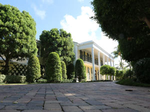 Unsurpassed elegance & beauty abound this stately Colonial home. This one of a kind completely renovated mansion is situated on 1/2 of an acre of land with over 150 feet of water frontage overlooking prestigious Everglades Golf Course. Located in the heart of Palm Beach minutes from Worth Avenue shops and world class dining.