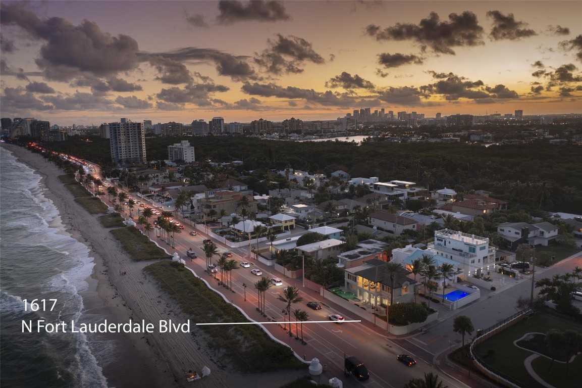 100'± DIRECT OCEANFRONT | CORNER LOT PROVIDES WIDE PANORAMAS | PRIVACY WALL & GATED | OCEANSIDEPOOL | S-TILE ROOF REPLACED 2013± | ORIGINAL STRUCTURE CIRCA 1950S WITH 2ND FLOOR & RETROFIT CIRCA2000± | IMPACT WINDOWS | UTILITY ROOM WITH ADJACENT BATH POSSIBLE 4TH BEDROOM CONVERSION |GROUND LEVEL BEDROOM SUITE VIEWS OCEAN | PRIMARY BEDROOM HAS ADJACENT OFFICE OR GYM,OCEANFRONT TERRACE, BATH WITH SPA TUB. UPPER-LEVEL GUEST BEDROOM SUITE VIEWS OCEAN. YARD AREAFOR PETS OR PLAY AREA. WALK TO BIRCH STATE PARK WITH BICYCLE PATH & KAYAKING. NEARBY DOG BEACH ATSUNRISE BLVD.