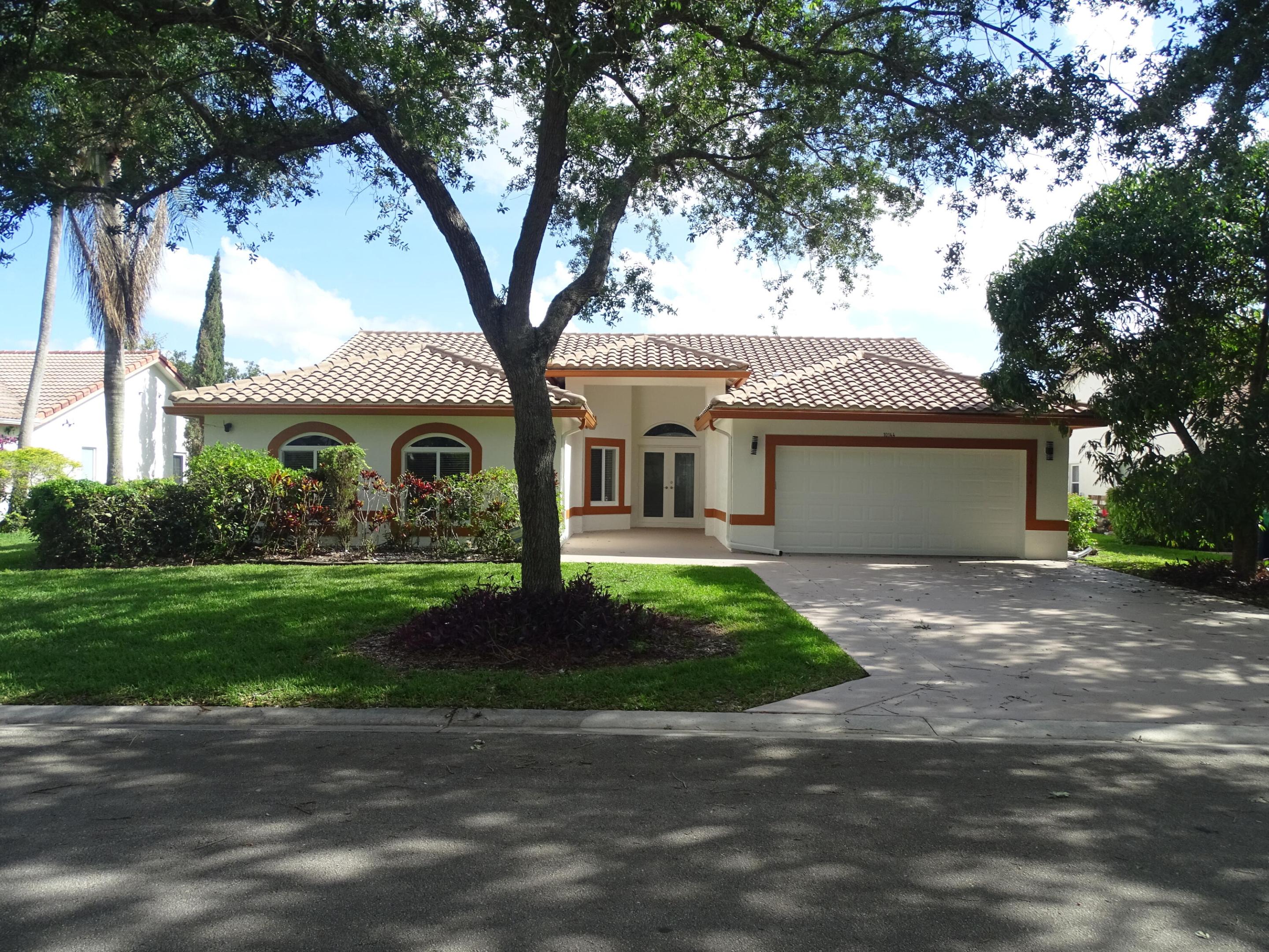 Total 3287 sq. ft. (area under A/C: 2478 sq. ft., 2-car Garage: 441 sq. ft., Covered entry: 73 sq. ft., Covered patio: 295 sq. ft.). fresh paint job; Roof still under warranty; New 40-ton AC/Heating System, Impact Windows/doors; "S" ceramic tile roof still under warranty;16 inch gutters; Accordion shutters in Patio; cooking deck in patio;  renovated bathrooms; Large Fully renovated  heated pool and spa with Automatic pool chlorinator; New gas pool/spa heater/200-gallon gas tank on site; smart 50-gallon water heater; Expanded concrete driveway; Upgraded kitchen with granite counter and backsplash; floors with 16-inch ceramic tiles; Marble/tile bathroom floor; Hurricane proof 2-car garage door;  Camera and Alarm systems; External generator hook up; hybrid 10,000 watts generator included