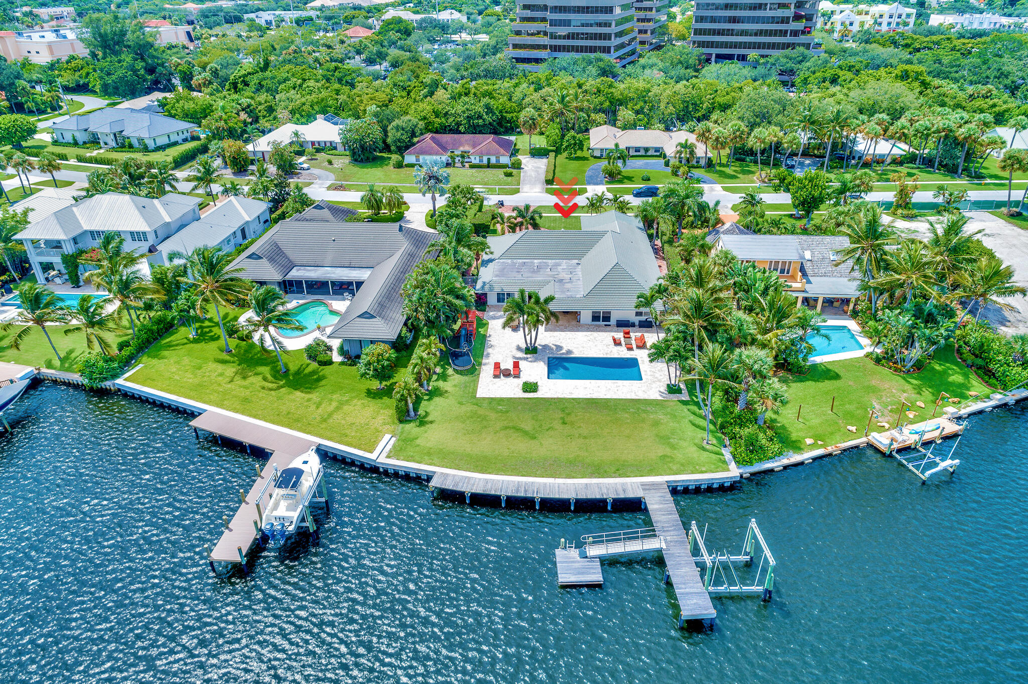 Enjoy the TRUE ESSENCE of South Florida living in this brilliantly designed CBS residence in the highly desirable neighborhood of Hidden Key!  

Immediately upon entering this warm and spectacular residence you will experience wide water views that will take your breath away. Enjoy watching the kids laugh as they wake board or water ski on one of South Florida's most memorable waterways. This community is known for epic trick or treat & NO HOA! This premier lot (.5 acre!) centered in the middle of Little Lake Worth and is situated with exceptional views of Lost Tree Village. This impressive property is located in close proximity to both the Palm Beach Inlet & as well as shopping, first class restaurants and phenomenal schools. This 5 bedroom residence is a thoughtfully designed CBS structure and truly encompasses the true essence of floor living. Enjoy entertaining family and friends in the open space that is the true essence of Florida living. Let the kids fish off the dock or swim in the newly resurfaced salt water pool while watching sports or movies on the outdoor entertainment area.

This property has impeccable internals including a top of the line Remy air purification system, premier water filtration as well as entire new HVAC system. Impact glass throughout. Don't miss this amazing opportunity to experience the true essence of Florida living.

Please contact us to schedule your private showing today!