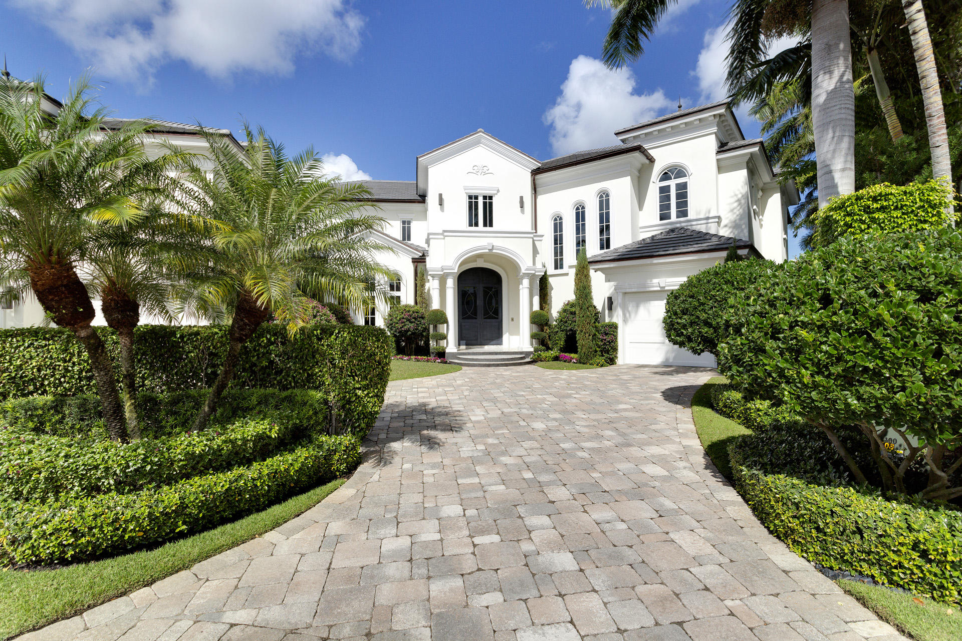 Gorgeous protected views overlook the Deepwater to the Intracoastal and natural parklands from this beautifully landscaped Modern-inspired estate on 185+/- feet of shoreline, one property from the point, with yacht dockage plus a floating dock for other water craft.  Outdoor entertaining is at home in the resort-like waterfront haven featuring a saltwater heated infinity pool with overflow spa by the open-air living room with a fireplace, summer kitchen, and retractable screens.  The adjacent property is additionally available, giving the option to create a sprawling compound on 300ft of protected dockage just minutes away from Boca Raton Inlet. DISCLAIMER: The written and verbal information provided including but not limited to prices, measurements, square footages, lot sizes, calculations and statistics have been obtained and conveyed from third parties such as the applicable Multiple Listing Service, public records as well as other sources. All information including that produced by the Sellers or Listing Company are subject to errors, omissions or changes without notice and should be independently verified by any prospect for the purchase of a Property.  The Sellers and Listing Company expressly disclaim any warranty or representation regarding all information.  Prospective purchasers' use of this or any written and verbal information is acknowledgement of this disclaimer and that Prospects shall perform their own due diligence.  Prospective purchasers shall not rely on any written or verbal information provided when entering a contract for sale and purchase.  Some affiliations may not be applicable to certain geographic areas. If your property is currently listed, please do not consider this a solicitation. In the event a Buyer defaults, no commission will be paid to either Broker on the Deposits retained by the Seller.  "No Commissions Paid until Title Passes."  Copyright 2019 Listing Company. All Rights Reserved.