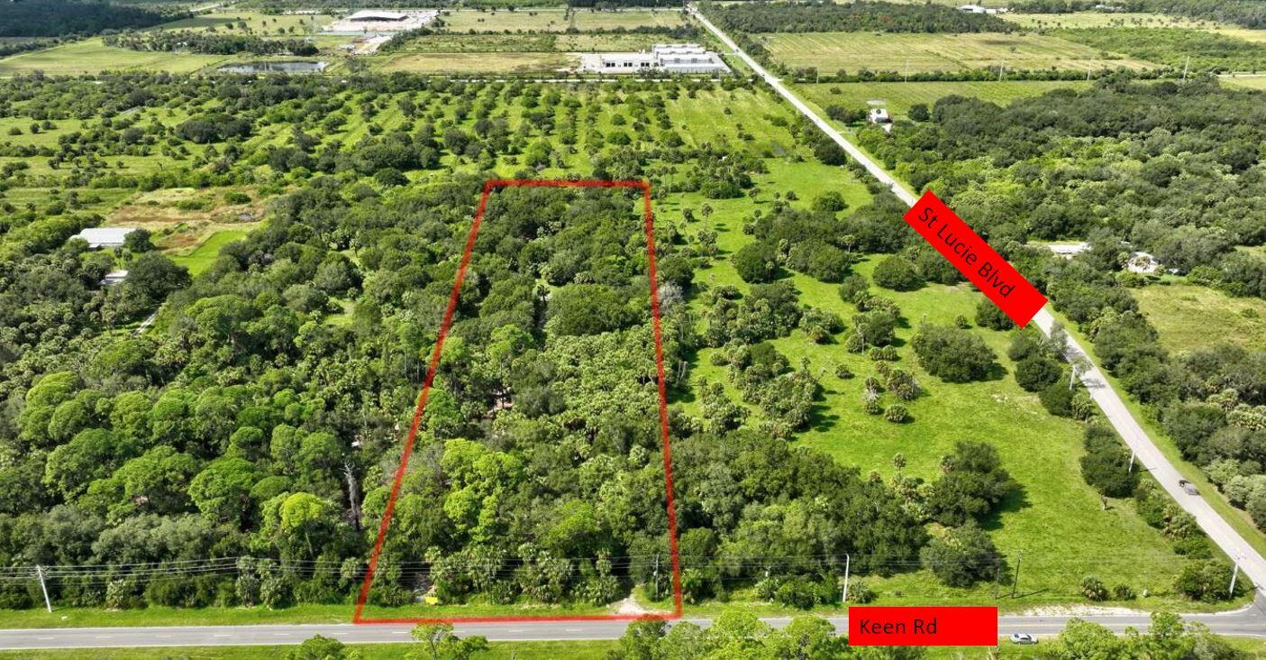 Discover a rare investment opportunity in one of Fort Pierce's most rapidly developing corridors. This expansive 10-acre parcel has recently been rezoned to Industrial Light, opening the door for a wide range of commercial and industrial uses. This land is seconds from the Treasure Coast Airport.   Strategically located in a high-growth area over the next few years, this property is surrounded by several upcoming developments. Making it an ideal site for forward-thinking investors or owner-users looking to capitalize on the area's booming expansion.  The owners are also open to doing a JV development, or outdoor storage or small bay warehousing.