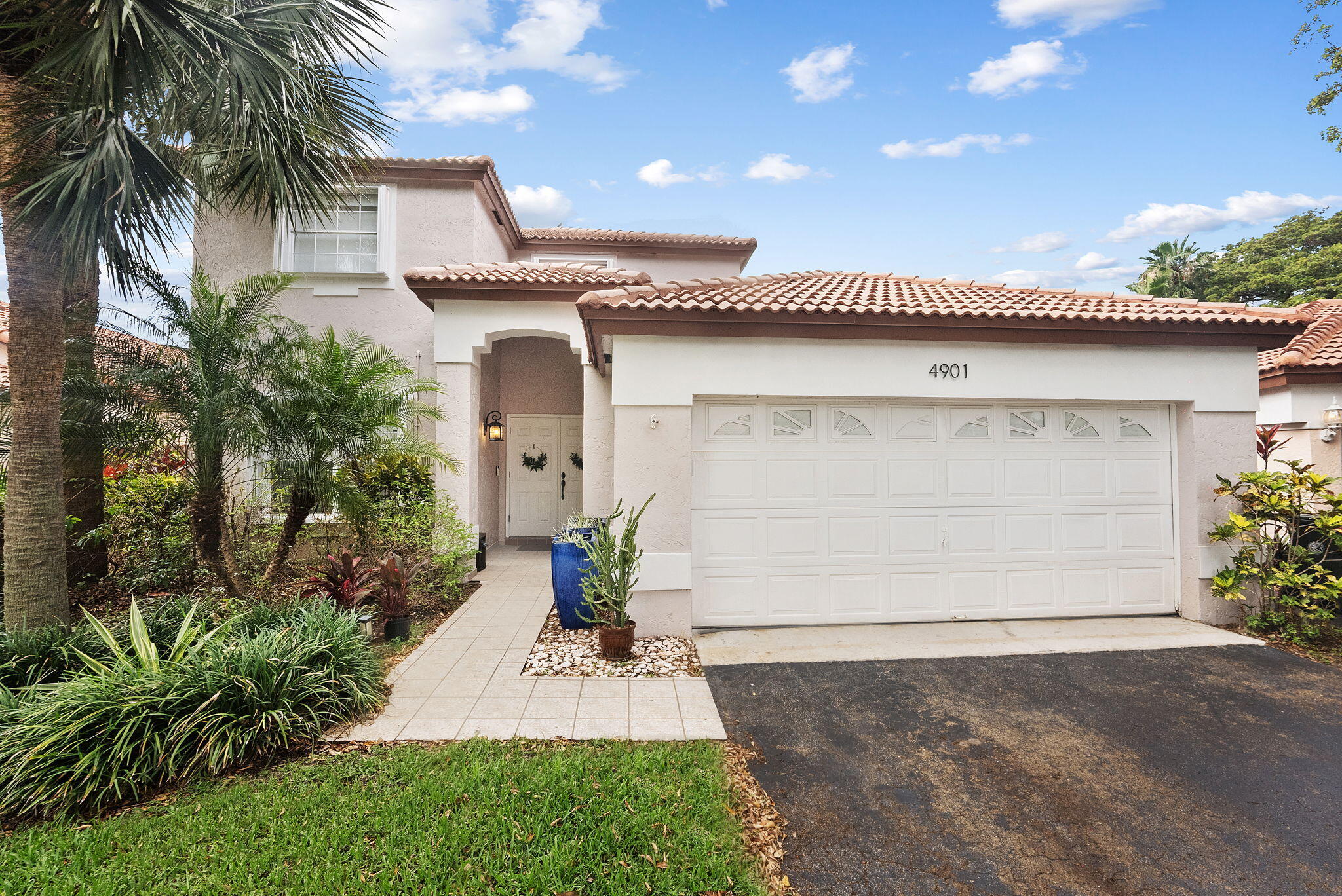 This exceptional home truly checks all of the boxes - fully upgraded in a gated community with low HOA and zoned for A-rated schools! Upon entering this 3 bed/2.5 bath home, you will notice the abundance of natural light and soaring ceilings. Meticulously upgraded and maintained, enjoy porcelain plank floors, smooth-finished walls and ceilings, custom window treatments, and walk-in closets with built-in shelving. The kitchen features stainless steel appliances and wood shaker cabinets. Primary suite features his & her closets, dual sinks and glass shower enclosure. Upstairs you will find the additional 2 bedrooms and 1 bathroom with tub/shower combo. Enjoy entertaining in your fenced-in backyard with travertine paver patio. Amenities include community pool and tennis/pickleball courts.