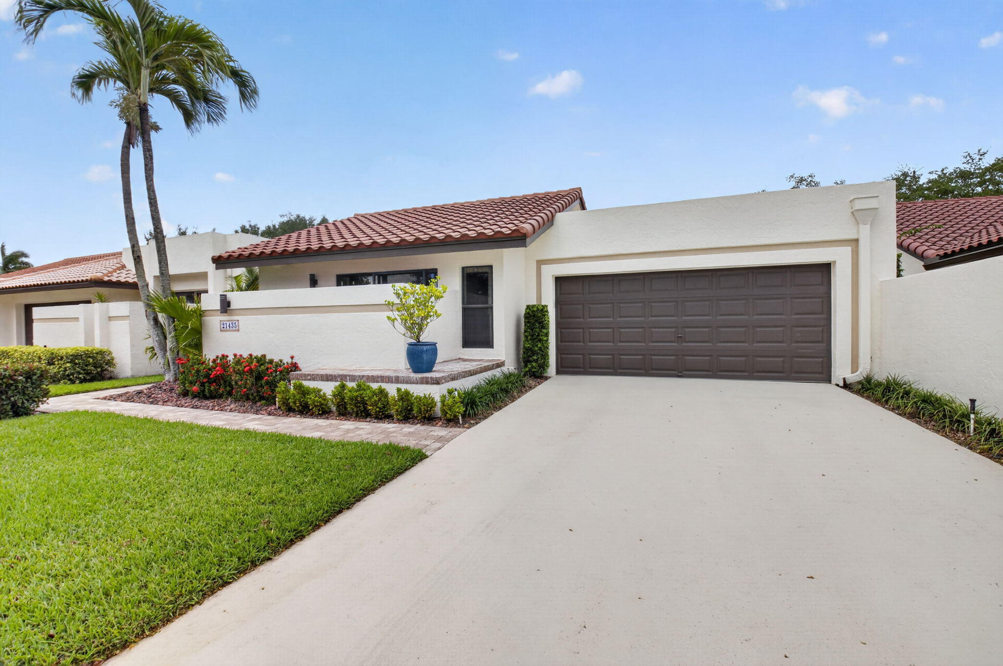 Beautifully maintained home featuring 2 bedrooms, 2 bathrooms, and a 2-car garage in one of Boca Raton's most desirable locations. The spacious primary suite offers plenty of storage, while the living room  can be used as a den, office, or easily converted into a 3rd bedroom.  Low HOA Fees . All A-Rated Schools Step outside into your own private tropical oasis . The backyard has been professionally landscaped with stunning tropical plants, elegant pavers, and over $35,000 in upgrades creating the perfect space to relax or entertain. Conveniently located close to shopping, dining, parks, and major highways.  Can be rented out immediately.  This home truly has it all!