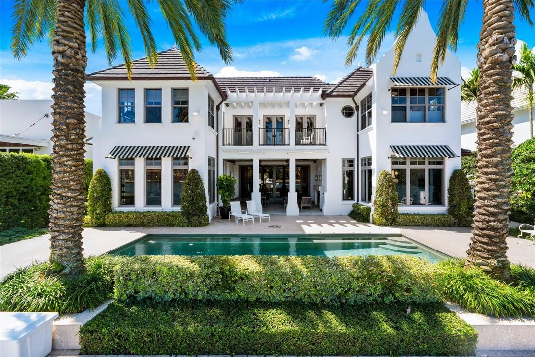 Seeking extraordinary wide open views & highest quality custom construction? Add to this a prime & valuable location on one of Rio Vista's finest Isles! Stunningly serene & mesmerizing New River views captured from many rooms of this highly sophisticated Bermuda inspired architecture, timeless transitional interiors & exquisite detailing. The truly functional floorplan offers great room, 3 fireplaces & bar. Ultimate Chef's kitchen, family & breakfast room. Limestone floors throughout entertaining areas. Large covered terrace. 2 offices, 2 laundry rooms, gym & VIP suite with option for 1st floor bedroom suite. The 2nd level primary suite is complete with dressing area, custom closets & spa bath, access to large balcony. Potential to add 5th bedroom. Immaculate Architectural Digest quality!