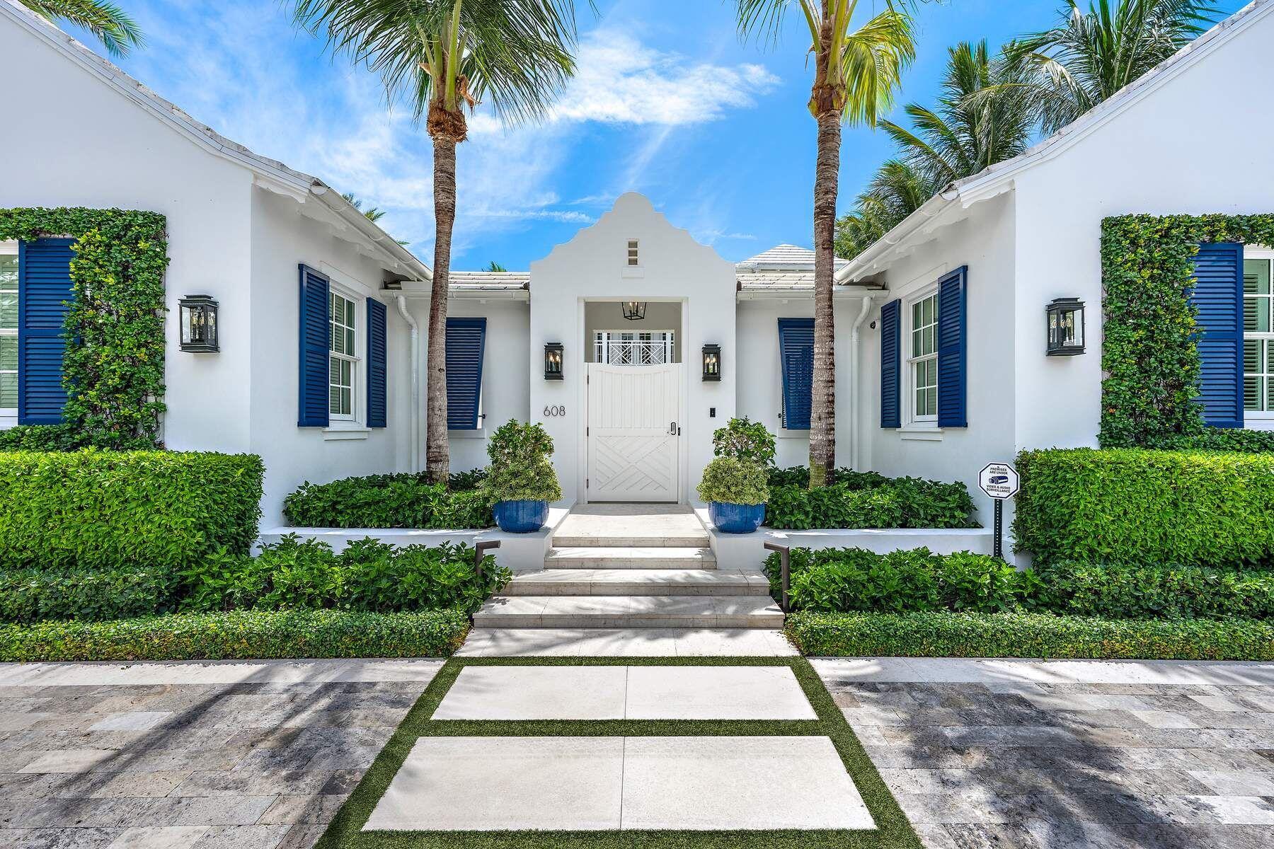 Stunning ''nearly new'' waterfront residence, complete with private dock centrally located on desirable Everglades Island. Offered completely furnished by noted designer Scott Snyder makes this a wonderful opportunity to begin your Palm Beach lifestyle. Every custom detail can be seen throughout this residence from the grand staircase, gracious living room, dining room, den, gourmet kitchen, family room with vaulted ceiling, to the outdoor loggia with fireplace that leads out to the manicured pool area. Two bedrooms with baths ensuite, powder room and private elevator complete the main level. The second level includes a bedroom with bath en-suite, an amazing Master Suite, with sitting area, two baths en-suite, luxurious closets & private terrace overlooking the water and pool area. Separate Guest House. Three car air-conditioned garage. Full house generator.  Finishes to include venetian plaster walls, marble and hardwood floors. top of the line security system.  Glass enclosed wine room.