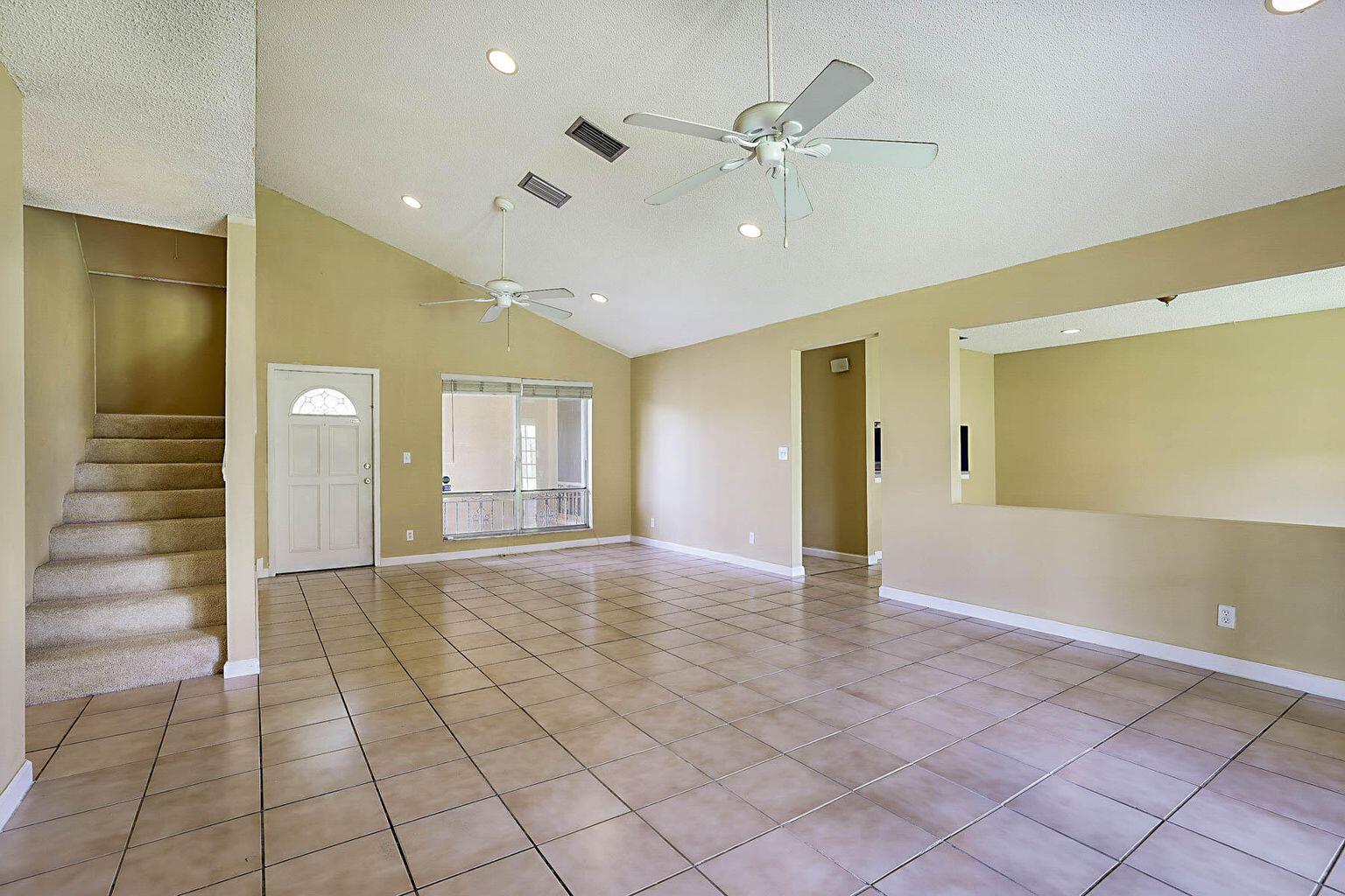 Make homeownership more affordable with this beautifully maintained home featuring tile flooring in the main living areas and brand-new carpet upstairs. The spacious eat-in kitchen offers a breakfast bar and pantry—ready for your personal touch. Enjoy a large fenced backyard perfect for entertaining or relaxing. New A/C installed in 2024 for peace of mind. Ideally located near shopping, dining, and major highways (I-95 & Turnpike), and zoned for an A-rated middle school—a perfect blend of comfort, convenience, and value!