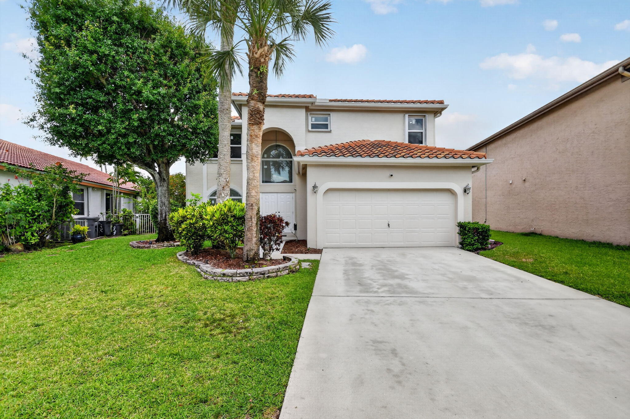 Nicely updated two-story home with beautiful waterfront views! Features include a new roof (2024), plus a new A/C, hot water heater, and electrical panel installed this year. Freshly painted inside and out with brand-new carpeting throughout. The backyard has plenty of room for a pool with a beautiful water view. Located in the highly desirable Northtree community in Lake Worth, within excellent school districts. Move-in ready and close to everything! Enjoy community amenities including a pool, clubhouse, tennis courts, and pickleball courts just steps away. Come experience the wonderful friendly lifestyle Northtree has to offer!