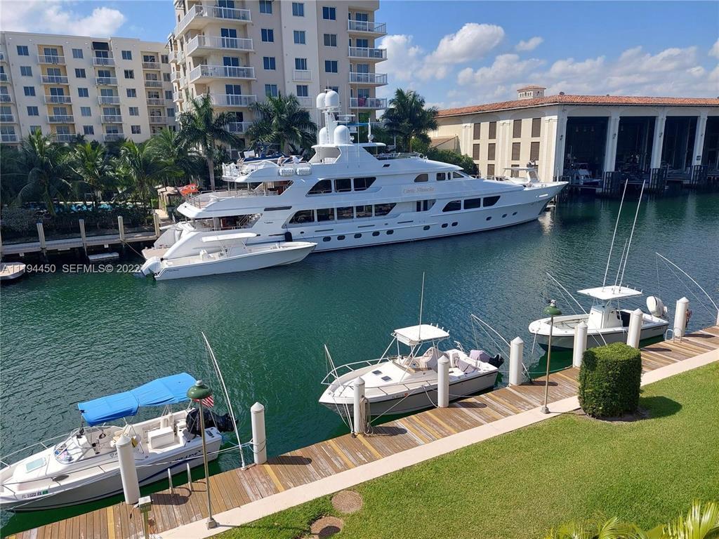 BOAT DOCKAGE DIRECTLY BEHIND UNIT!! Welcome to this beautifully renovated, oversized waterfront condo offering the perfect blend of style, comfort, and coastal living PLUS DOCKAGE!! Set in a vibrant marine environment, this residence provides a front-row seat to constant boating activity, with large yachts docked just across the way—creating a dynamic and picturesque setting that boat lovers will truly appreciate! Dock up to a 42 foot boat with quick access to the inlet for only $6.50 per foot per month!! UNBELIEVABLE!! Inside, this spacious two-bedroom, two-bath home has been thoughtfully updated with all-new flooring, elegant quartz countertops, and fresh designer paint throughout!! The modern kitchen is equipped with brand-new stainless steel appliances, making it as functional as it is stylish! The expansive primary suite features a generous walk-in closet and a well-appointed en-suite bath. Your large private open balcony—perfect for entertaining—is complete with full hurricane protection and plenty of room to host! This is probably the largest balcony in the building!! (PICTURES DON'T DO IT JUSTICE!)  And the views across the water are sensational!  Lots of mega-yachts to see!  This property also includes parking for up to three vehicles (one tandem space and one additional single space). Whether you're seeking a full-time residence or a seasonal escape, this pet-friendly waterfront gem delivers exceptional value and lifestyle being ideally located just minutes from the beach, vibrant downtown, and Fort Lauderdale Airport!  AVAILABLE JULY 1, 2026 for Annual Lease!