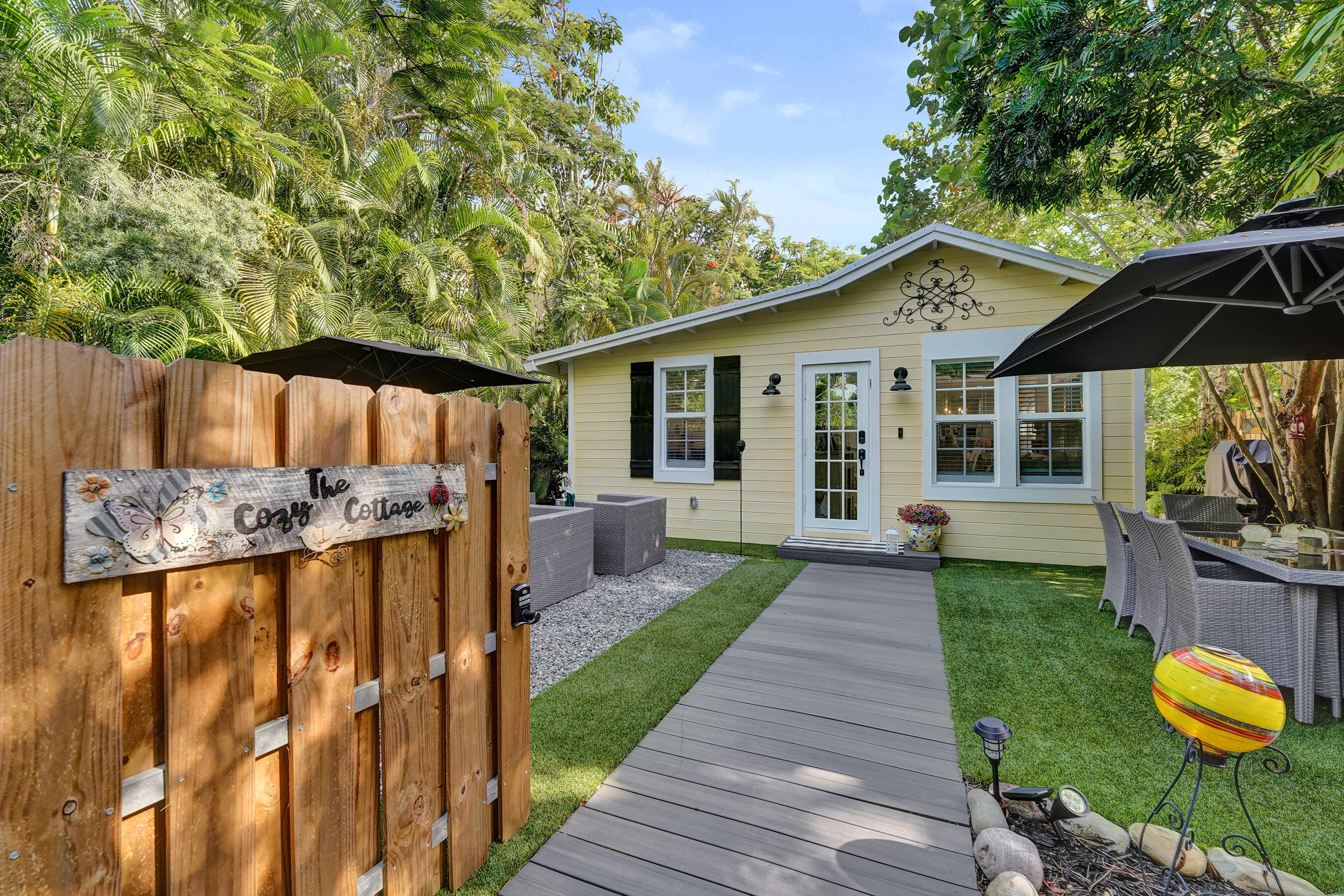 Step behind the private gates of this beautifully restored 1923 historic cottage in highly sought-after Sailboat Bend, where timeless character blends seamlessly w/ modern updates. Thoughtfully renovated thru/out, this 3-bed, 2-bath home features stunning designer kitchen, updated bathrooms, original hardwood floors, French doors & spacious living rm. addition enhancing both comfort & functionality. The fully fenced backyard is an entertainer's dream, complete w/ artificial turf, decorative gravel, multiple outdoor living & dining areas & mosquito misting system for year-round enjoyment. Addl. improvements incl. newer roof, A/C & fencing. Ideally located minutes from Las Olas, downtown, beaches, airport & major highways, this move-in-ready historic gem offers an exceptional opportunity!