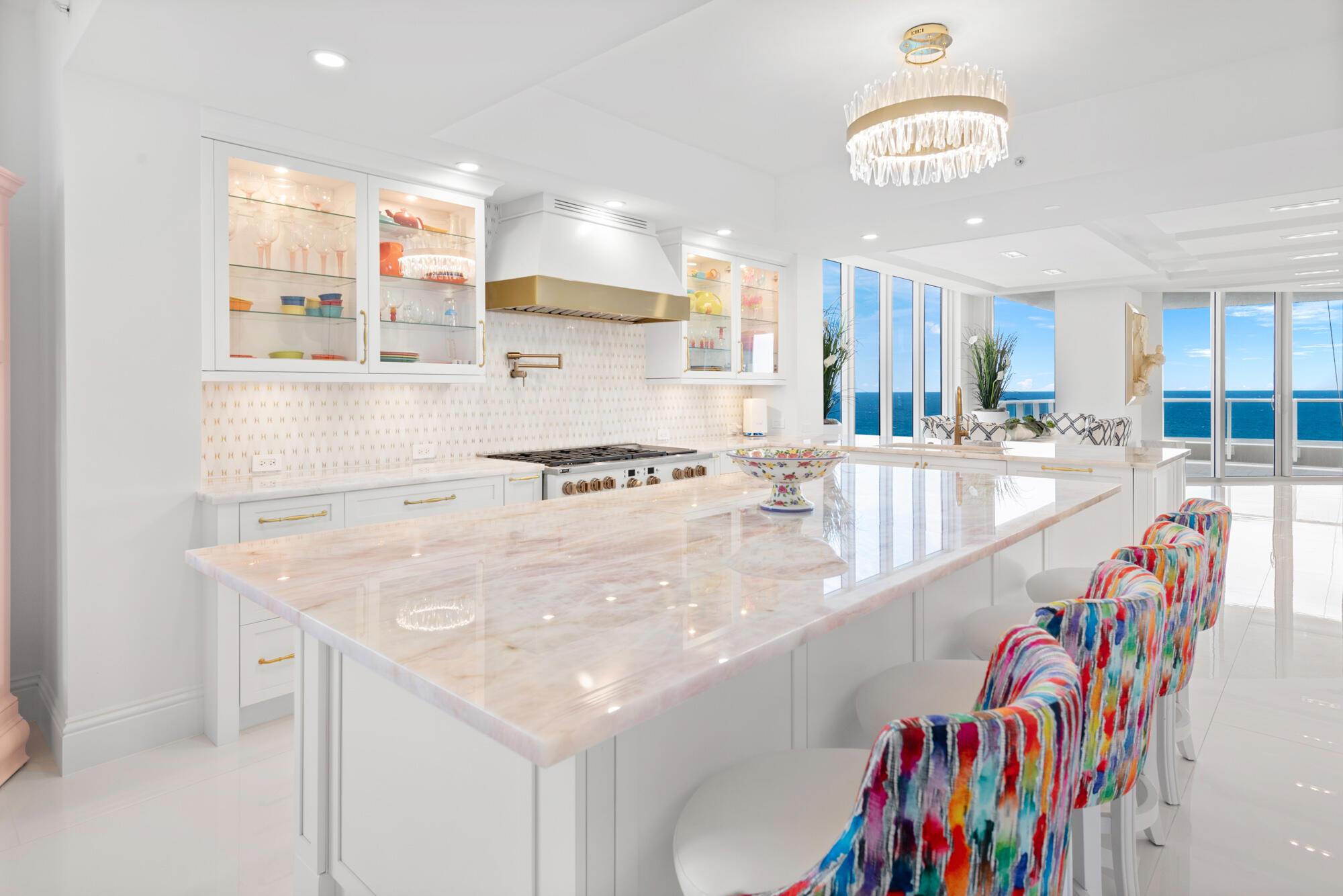 This fully renovated high floor residence at Oceans Edge, Singer Island, offers a luxurious living experience with no expenses spared. Elevator into private residence. 2 parking spots next to elevator. With a generous redesigned size of just under 4,000 square feet, 4 Bedroom, 4.5 bath, this residence provides ample space for the sought after South Florida lifestyle. The expansive balconies not only provide stunning views of the Atlantic Ocean and Intercoastal but also enjoy tropical breezes and the ambiance of coastal living. Entire north side of the 14th floor is incredible. The warm turquoise waters below and white sandy beaches are the definition of true relaxation Breathtaking sunrises and sunsets, this residence offers unforgettable views Beautiful Wolf Appliance, chefs kitchen, natural gas, high ceilings, open floor plan, huge closets. World class amenities, 2 pools, steam room, sauna, brand new oceanfront club room and a manned gate. Located just a short 5 minutes drive away from PGA Blvd... for convenient access to the best restaurants and shopping. Just minutes away form the best golf courses in South Florida and just a short drive to Palm Beach Island. Scuba, Fish or Snorkel from your oceanfront backyard.

Private FBO 15 minutes and new Brightline Train station 15 minutes.