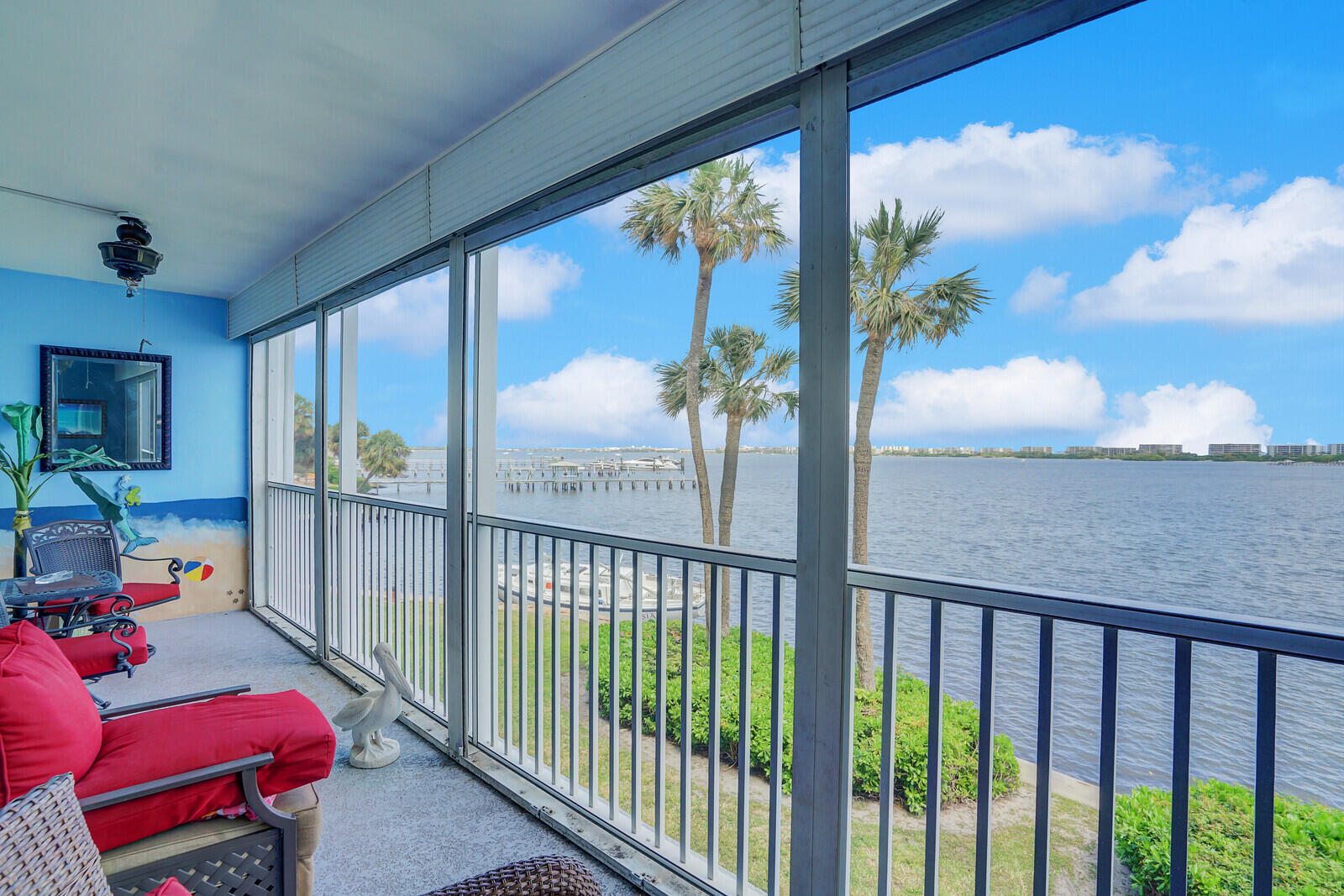 Perfectly positioned along the wide stretch of the Intracoastal, this 2-bedroom, 1.1-bath residence in Waterway Club offers breathtaking water views and an incredible opportunity to enjoy true South Florida waterfront living. The main living areas and one of the bedrooms showcases sweeping Intracoastal vistas, creating a serene backdrop from sunrise to sunset. This residence features a true 2-bedroom floor plan, a valuable feature for those seeking additional privacy and flexibility.  Ideally located just north of the Lantana Bridge, this residence offers quick and convenient ocean access while placing you moments from waterfront parks, shopping, dining, and the area's beautiful beaches. Boating  enthusiasts will appreciate being just steps from Loggerhead Marina and Freedom Boat Club, with direct property access through a convenient community gate. Residents also enjoy access to amenities shared with sister community Hidden Harbour, including a clubhouse, pool, sauna, shuffleboard, and exercise room. Additional highlights include elevator building access, all assessments paid, and a prime location approximately 15 minutes from Palm Beach International Airport, making this an exceptional opportunity for seasonal or year-round coastal living.