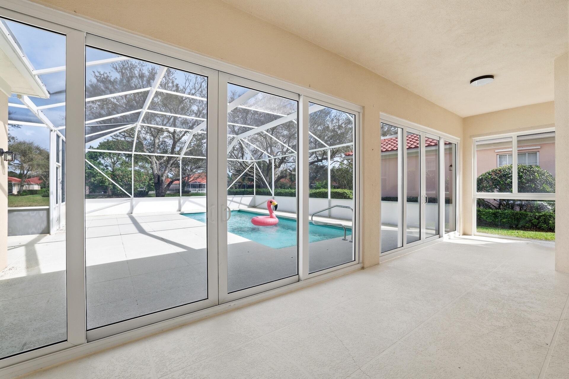 Come see this beautiful Windsor model in the popular Riverwalk community. This home is a 4 bed plus den, screened pool home overlooking a serene canal. The floor plan of this home is split 3 ways, offering a second master bedroom with ensuite bathroom. This home also features a new, unique, barrel style metal roof! The solar panels will help keep your energy costs low. You will also find a closed in porch with hurricane impact sliders. The community offers manned security, interconnecting walkway bridges, a beautiful clubhouse with an on-site restaurant, community pool, tennis, pickleball, and more! Riverwalk is centrally located and close to the turnpike, the international airport, beaches, I-95, shopping, restaurants and downtown WPB. Come see it today!