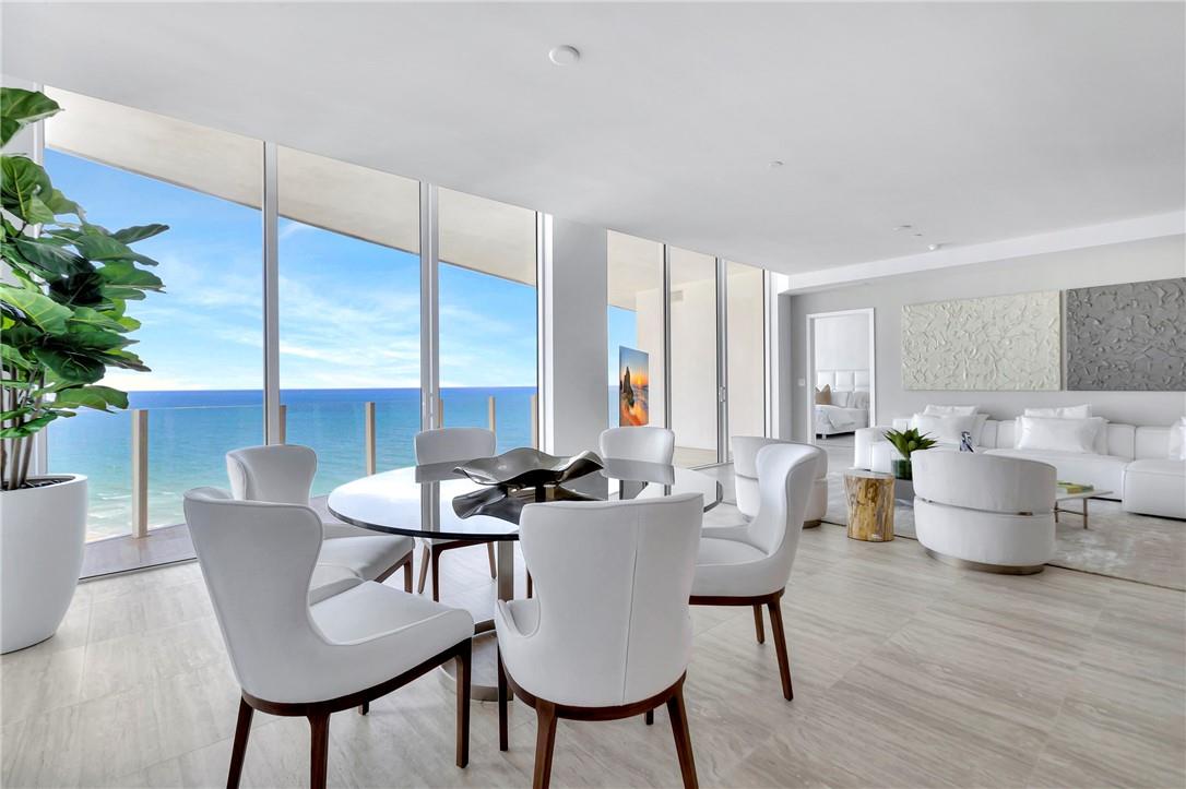 BRAND NEW FULLY FURNISHED HIGH FLOOR FOUR SEASONS OCEANFRONT PRIVATE RESIDENCE WITH 2 SELF PARK OR VALET GARAGE PARKING , Fourteenth floor, private residence with 2 bedroom, 2 1/2 bath and a Northeastern exposure with direct ocean views. Dramatic floor to ceiling glass and gracious open terraces afford you ample natural light throughout the home. Gourmet kitchen with custom lacquered cabinetry, Sub Zero Wolf appliances. Elegant owners retreat split configuration optimizes privacy between you and your guests. Abundant closet space throughout this luxury residence. Baths are adorned with signature marble, custom oak cabinetry, and brushed nickel Waterworks fittings.