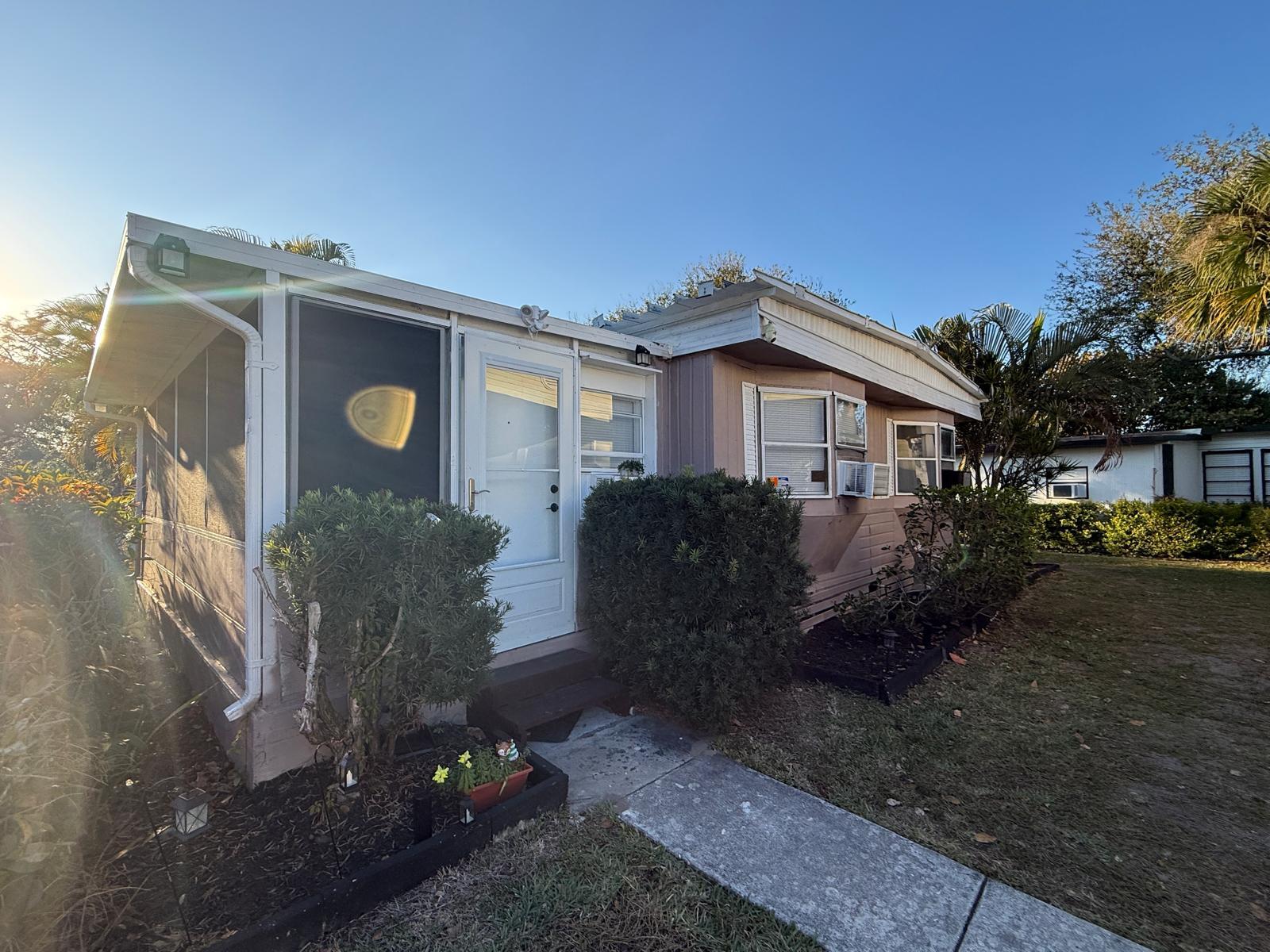 Charming mobile home featuring 4 bedrooms, 3 bathrooms, All age,-The Meadows Florida, a beautiful kitchen, laundry room, outdoor kitchen, and a spacious, breezy porch perfect for relaxing. Located in a community '' The Meadows '' with amazing amenities: playground, BBQ area, gym, pool, basketball court, and clubhouse -- all just steps away! Enjoy its prime location, close to the PGA Mall, university, public transportation, and only minutes from the beach. Includes parking for 2 cars. Enjoy the community amenities. All measurements are approximate. Park Lot rent aprox. $1600. This property is available for purchase Cash only.  Call the listing agent today to schedule your private tour. Park Lot rent aprox. $1600