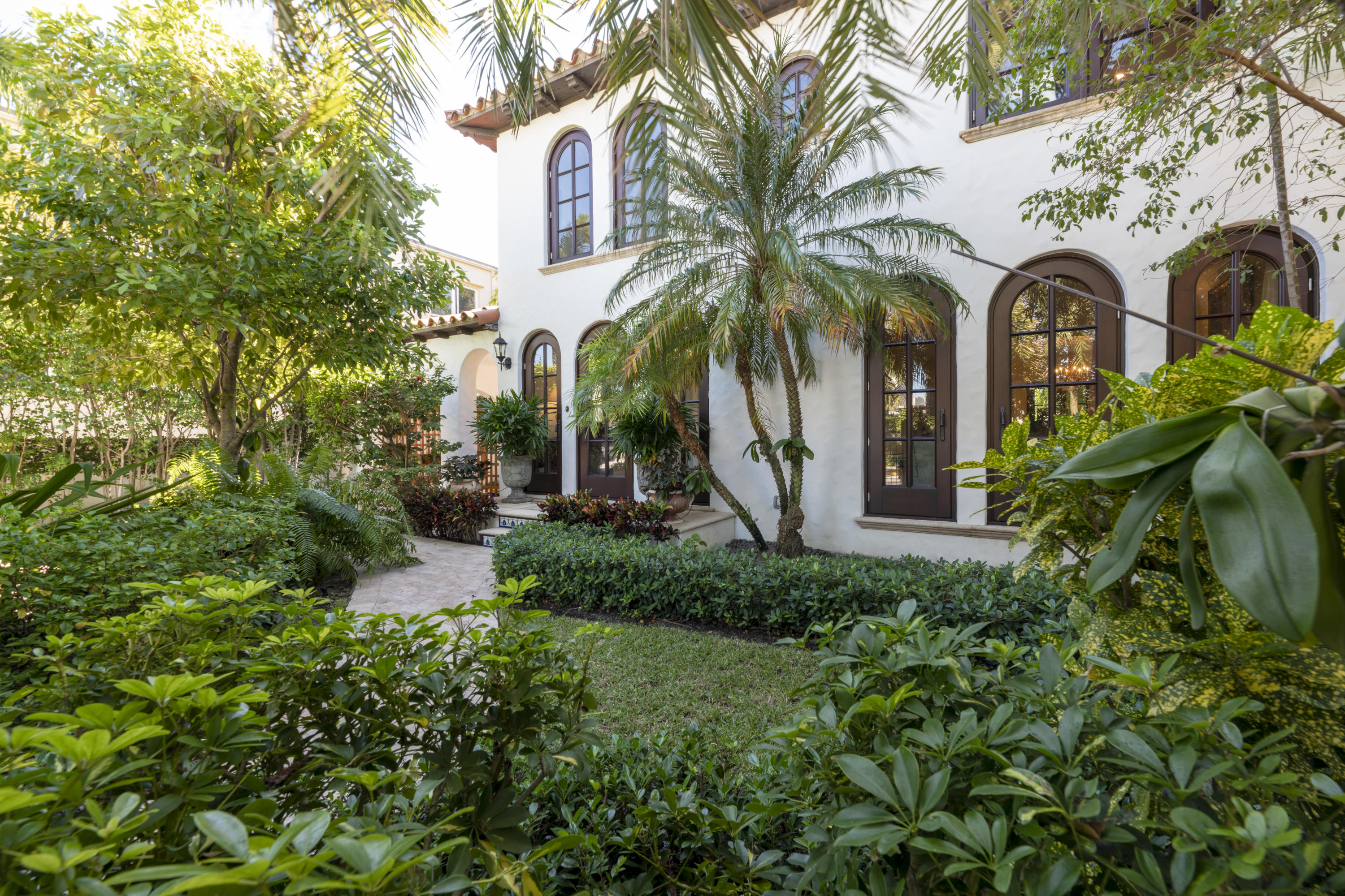 Winner of the Polly Earl Award for exceptional renovation, this landmarked four bedroom/three and half bath home has been updated with a full-house generator, Luxbaum impact glass windows and new A/C. Beautiful pool and private patio area. Quiet and peaceful in the center of town, the home is ready to occupy in the 2021 season.