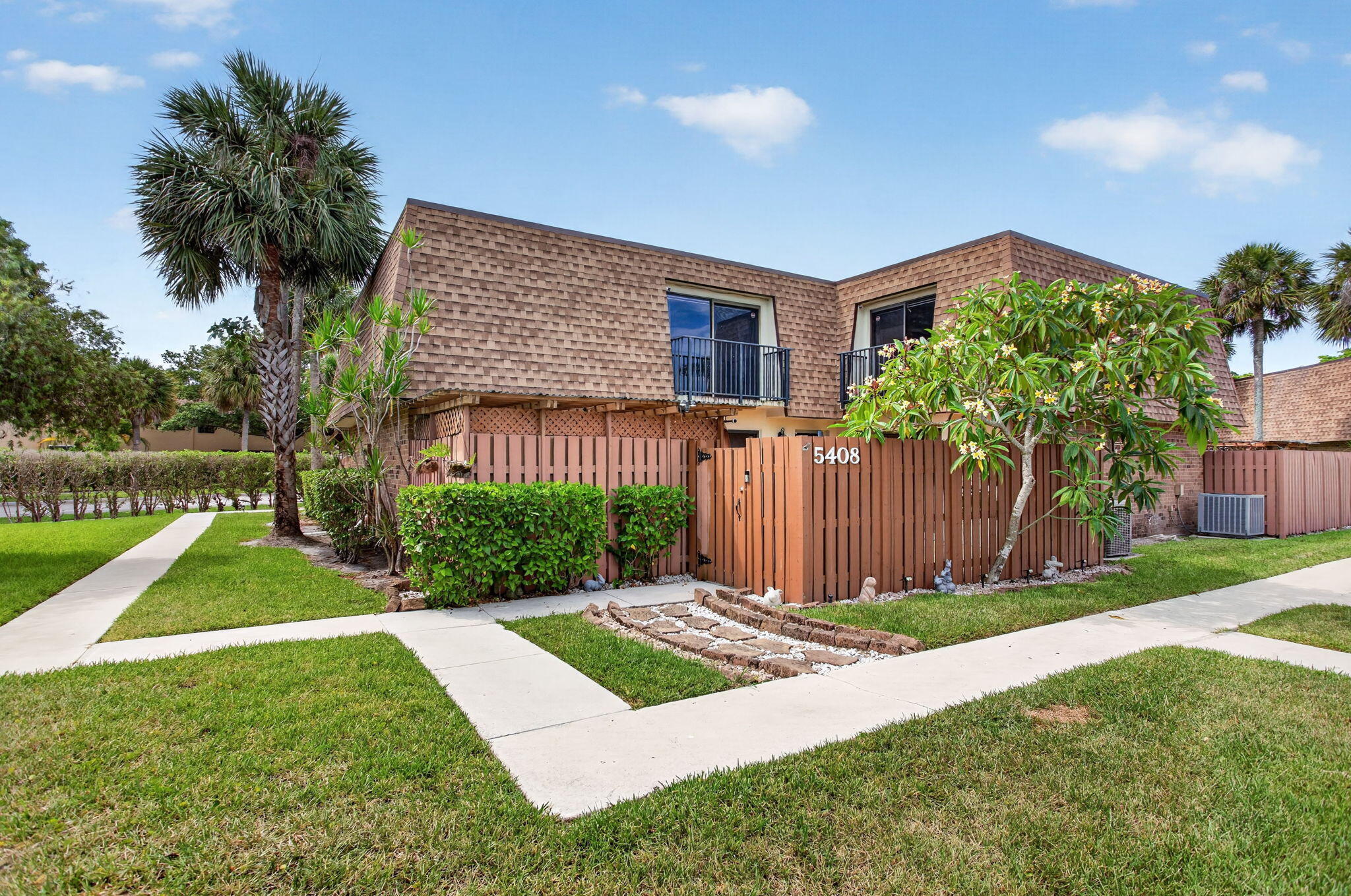 Private courtyard living highlights this 3-bedroom, 2.5-bath home in Woodland Lakes Estates, ideally located in the heart of Tamarac. The two-story layout features an updated kitchen with granite countertops, white cabinetry, SS appliances, and a breakfast bar overlooking the dining area. Tile flooring spans the main level, along with a convenient half bath. Upstairs, the primary suite offers a walk-in closet and renovated bath with dual vanities and a glass-enclosed shower. Two assigned parking spaces and ample guest parking add everyday convenience. Residents enjoy access to a community pool, tennis courts, clubhouse, playground, and walking paths, all just minutes from shopping, dining, parks, schools, and major roadways.