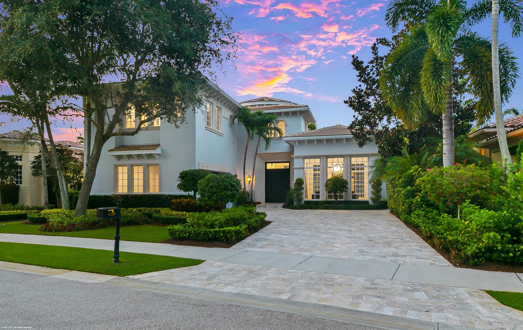 Newly renovated Bellucia floor plan with private water feature view. This expansive home boasts volume & detailed ceilings, crown molding, marble & wood floors throughout, large courtyard- perfect for entertaining. The exquisite master suite features his & her walk in closets w/ custom built ins; a lavish bathroom including soaker tub and body sprays in the shower. Bedroom 5 also makes a great office space, with a full bathroom, closet & built in wet bar. The 2nd story encompasses 3 guest suites each with their own bathroom, a powder bathroom and fantastic loft- a great space for guests to relax & enjoy away from the main living areas.

Recent upgrades include- brand new bathrooms, new air conditioning units, new roof, updated pool & spa with sun shelf & built in summer kitchen, new pav driveway, updated kitchen island with new quartz tops; new plumbing throughout.  

Membership is available, but not mandatory.  Members can enjoy resort style living with access to Old Palm Golf Club's private Raymond Floyd designed championship golf course with practice studio, fine and casual dining options, spa, fitness center, pool, Casitas (hotel rooms) and beach access at Singer Island.