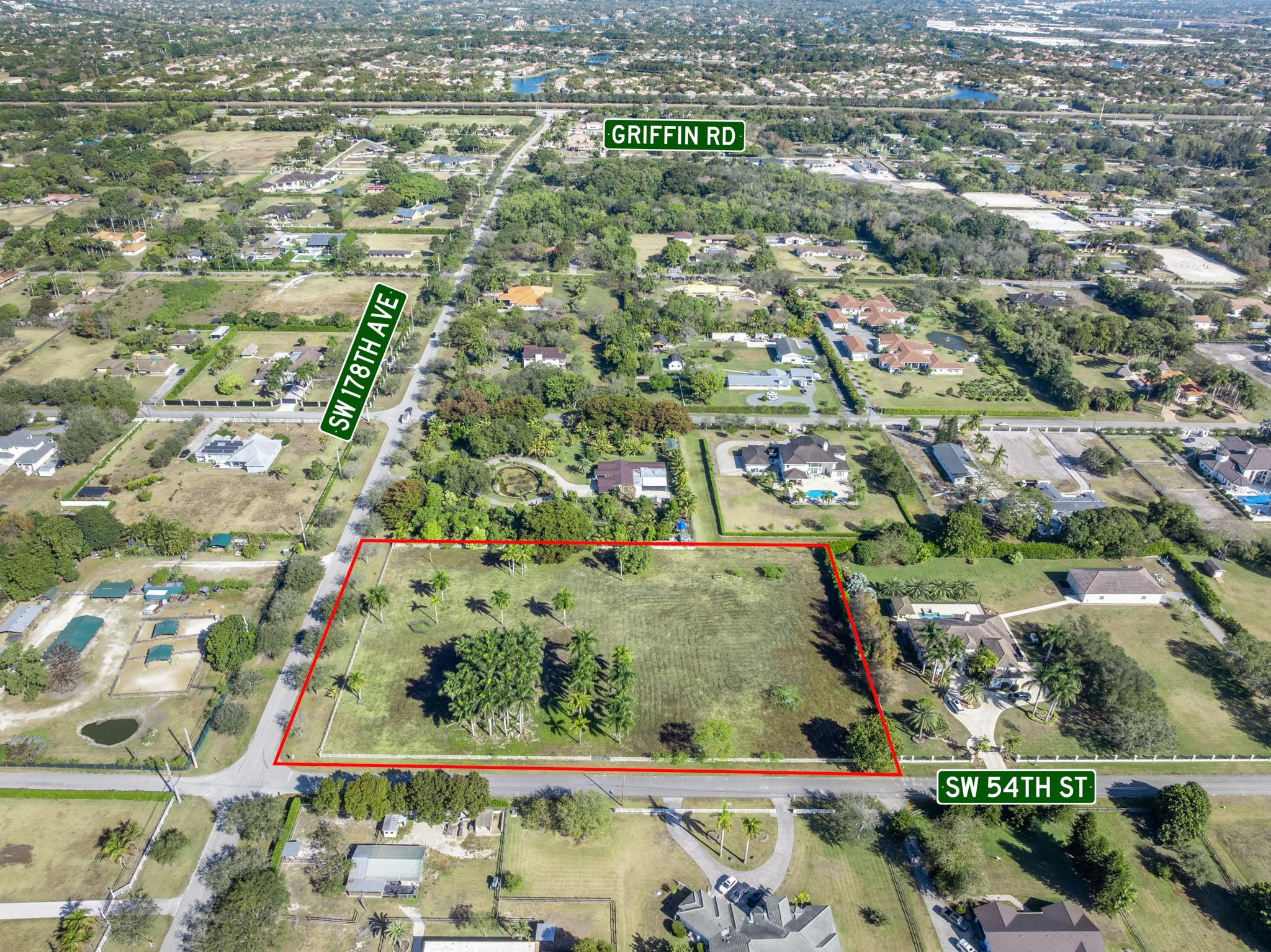 Exceptional 3.92-Acre Corner Lot in the Heart of Rolling Oaks in Southwest Ranches, Fla! This unique residential parcel is cleared & ready for its future Owner to design & build their dream estate! With this much land, the sky is the limit! JUST IMAGINE: a grand residence with exotic resort style pool, summer kitchen & winding driveway. CHECK! A detached Guest House. CHECK! A family recreational building w/a gym, spa & meditational retreat. CHECK! A state-of-the-art equestrian facility for your Race Horses! CHECK! The ultimate collector's car garage. CHECK! Your own tennis & pickleball courts. CHECK! If you can envision it... you can build it on this magnificent lot! Property is perimeter fenced, includes a well, septic tank & features statuesque Royal Palms. This is Estate Living in SWR!