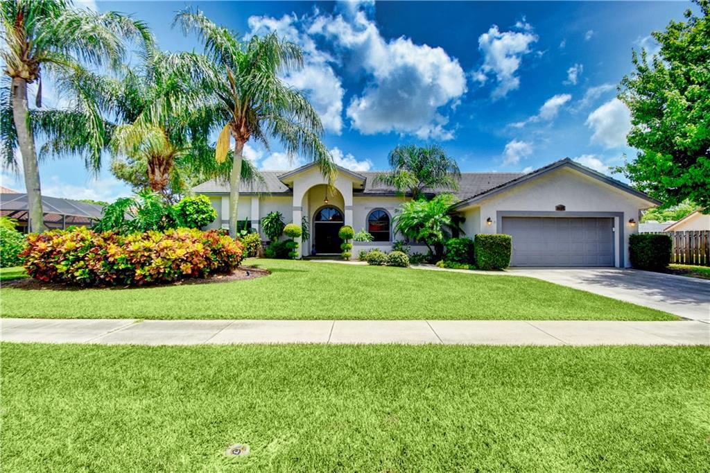 NEW TO THE MARKET - CALL TO SEE TODAY.  Won't last.   Very spacious pool home on one of the final lots developed in Plantation Harbor with up-to-date plumbing material, add'l insulation & more!  Extremely desirable split-bedroom plan.  Alarm system.  Upgrades in 2010:  new roof, refinished pool with waterfall,  Two (2) zone AC system.  Full cabana bath.  Shutters.  NO homeowner assoc./dues.   Beautifully landscaped yard with 4-zone sprinkler system.  Side-yard with room for a boat or rec. vehicle.  Covered and open patio areas.  2-car garage. Walking distance to nearby schools and Heritage Park.  Great Location:  Near numerous restaurants, shopping, FLL airport.  Please See Virtual Tour and numerous professional photos.  Easy to show -- CLA for access due to alarm.