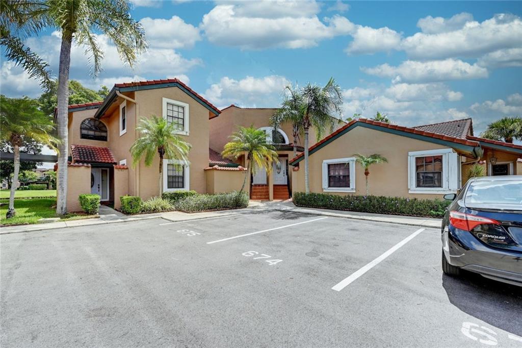 Gorgeous updated 3 bedroom 3 bathroom town house located in a gated community. The townhouse offers lake view that can be seen from the upstairs balcony and all of downstairs. 3 upgraded bathrooms with wood cabinets, glass shower doors and upgraded toilets'. Owners suite has its own private balcony, walk in closet and private bathroom. Newer AC unit and water heater (2018). Gated community with oversized pool and Clubhouse that can be used for parties. 2 parking spaces plus guest parking.