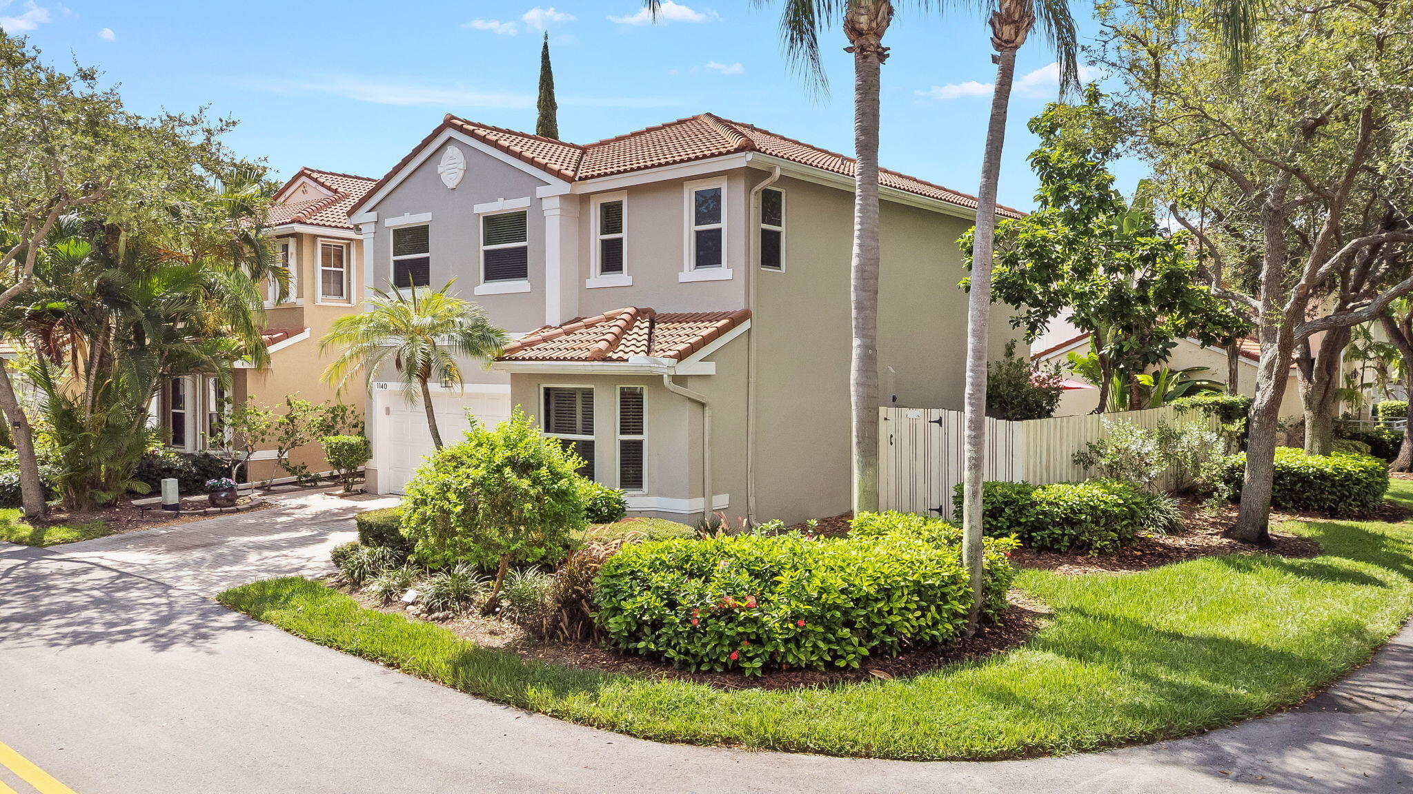 ABSOLUTELY BEAUTIFULLY REMODELED 3/2.5 OPEN CORNER WITH A 2 CAR GARAGE LOCATED IN WEST LAKE VILLAGE, WHICH IS GAURD GATED 24/7 AND LOCATED 1 MILE FROM THE BEACH. ALL IMPACT WINDOWS AND LARGE OPEN FLOORPLAN THAT BRINGS IN A TON OF NATURAL LIGHT. HIGH CEILINGS IN THE LIVING AND DINING AREA. MARBLE FLOORS THROUGHOUT THE DOWNSTAIRS AND WOOD FLOORS UPSTAIRS. STUNNING KITCHEN THAT OFFERS GRANITE COUNTER TOPS, LARGE ISLAND, STAINLESS STEEL APPLIANCES, CUSTOM CABINETS, AND WINE FRIDGE. PRIMARY BEDROOM HAS VAULTED CEILINGS, WONDERFUL WALK IN CLOSET ALONG WITH A SECOND CLOSET. PRIMARY BATHROOM HAS DOUBLE SINKS & SEPARATE TUB AND SHOWER. AMAZING PATIO AREA GREAT FOR ENTERTAINING, RELAXING, OR BBQ'S WITH LUSH LANDSCAPING AND NEW TEAK FENCE. AMENTITIES INCL 4 TENNIS COURTS, PICKELBALL, GYM, LARGE POOL BASKETBALL, JACUZZI, DOG PARK, AND KIDS PLAY AREA.