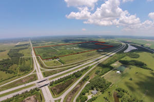 255 acre Hobe Sound  I-95 Interchange  parcel SE corner.  Improved Citrus Grove.  12 minutes north of Palm Beach County (1.3 million population)