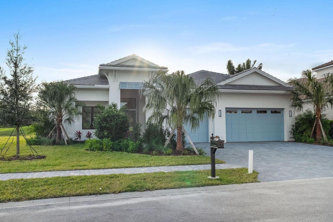 This home offers 3 bedrooms, 3.5 bathrooms, club room and a 3-car garage. Step into a world of refined living with 12-ft. volume ceilings, a great room featuring an entertaining bar and a chef's kitchen equipped with stacked cabinets, an oversized central island, walk-in pantry, quartz countertops and premium Café appliances including a 42'' built-in refrigerator, gas cooktop and wall oven/microwave combo. The master suite boasts a walk-in custom closet, dual vanities, a free-standing soaking tub and a large walk-in shower. The club room is perfect for gatherings and game nights, with built-in shelves and cabinets for storage. Enjoy seamless indoor-outdoor living with a travertine-tiled patio, a custom-designed pool with water feature and breathtaking golf course views.
