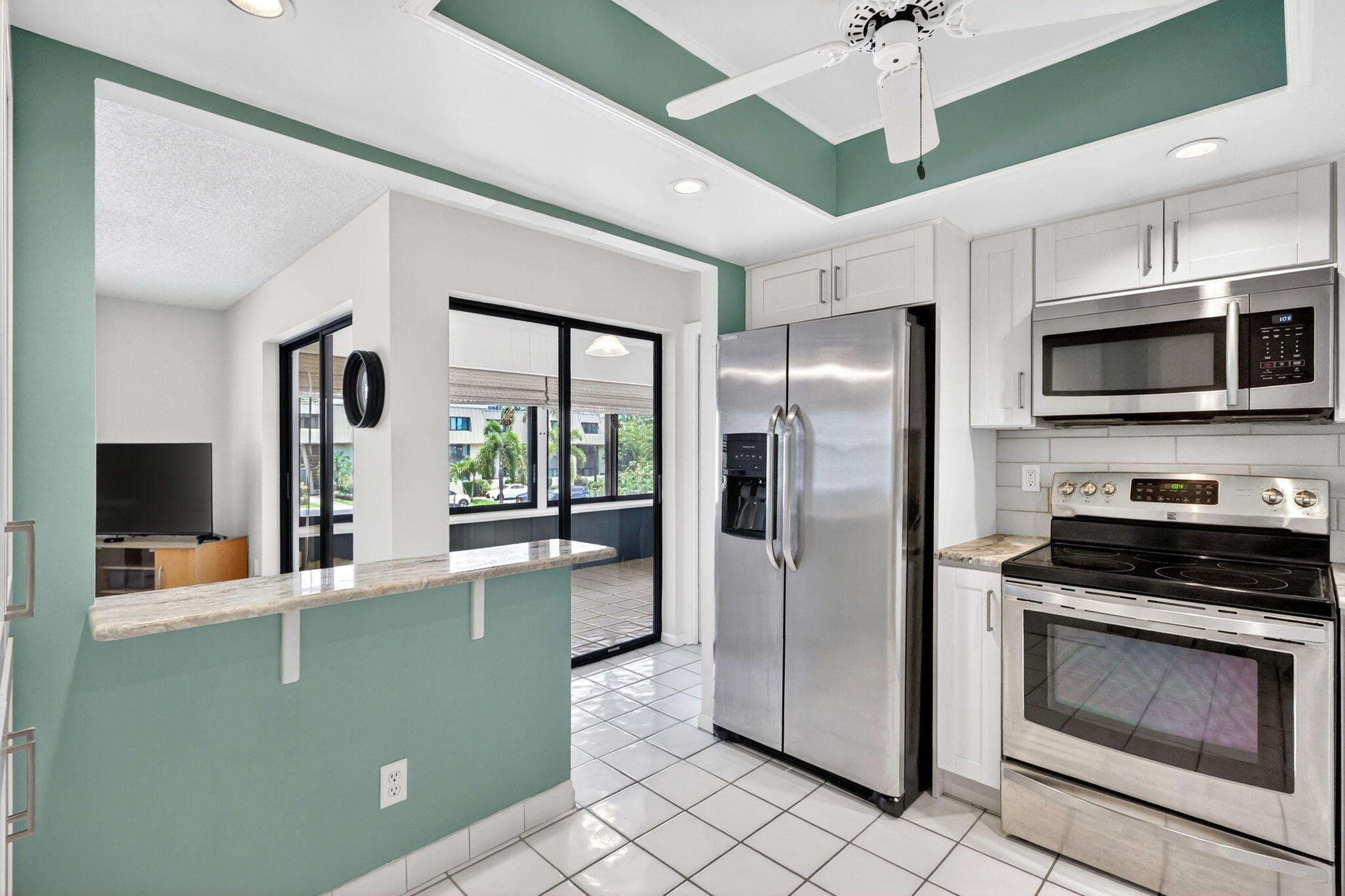 Welcome to Conquistador Condos, a highly desirable 55+ community offering comfort, convenience, and an exceptional South Florida lifestyle. This beautifully maintained residence features numerous upgrades throughout ownership, including a renovated kitchen with updated cabinetry, countertops, backsplash, recessed lighting, newer appliances, updated bathrooms, newer A/C, water heater, and flooring throughout. The association has completed major capital improvements and building assessments, adding peace of mind for future ownership. Conveniently located near shopping, dining, beaches, golf, medical facilities, and major highways. Enjoy resort-style amenities, manicured grounds, and pride of ownership throughout. Schedule your private showing today!