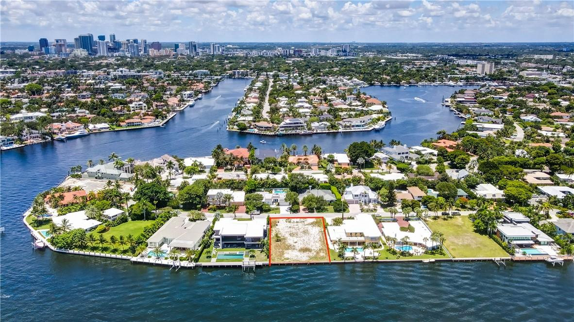 Oversized 16,502 s.f. Deep Direct Intracoastal Vacant land with plans to build in the exclusive Gated Sunrise Intracoastal neighborhood. This gated and patrolled enclave is nestled on the peninsula created by the convergence of the Middle River and the Intracoastal south of Sunrise Blvd. Walkable to dining and entertainment, world class beaches and minutes from downtown and FLL airport. This offering is “VACANT LAND & PLANS” and renderings to build an exquisite nearly 10,000sf custom residence. The current plans offer a spacious two story, 5 bedroom with study, 6 full bathroom home with 4 car garage. Designed with dramatic floor to ceiling windows to bring the incredible water views into every space, this home offers over 6,242sf of under AC living, and extensive loggias. Transferrable permits issued for a new 100 ft x 10 ft concrete dock and sea wall.  Upstairs oversized owners retreat with Dual owner retreat baths, three secondary bedrooms with full en suite bathrooms. Dramatic oversized terrace traversing the entire width of the upstairs of the home and offering direct access from most spaces on this level. This neighborhood is going through a substantial gentrification with homes upwards of $30M.