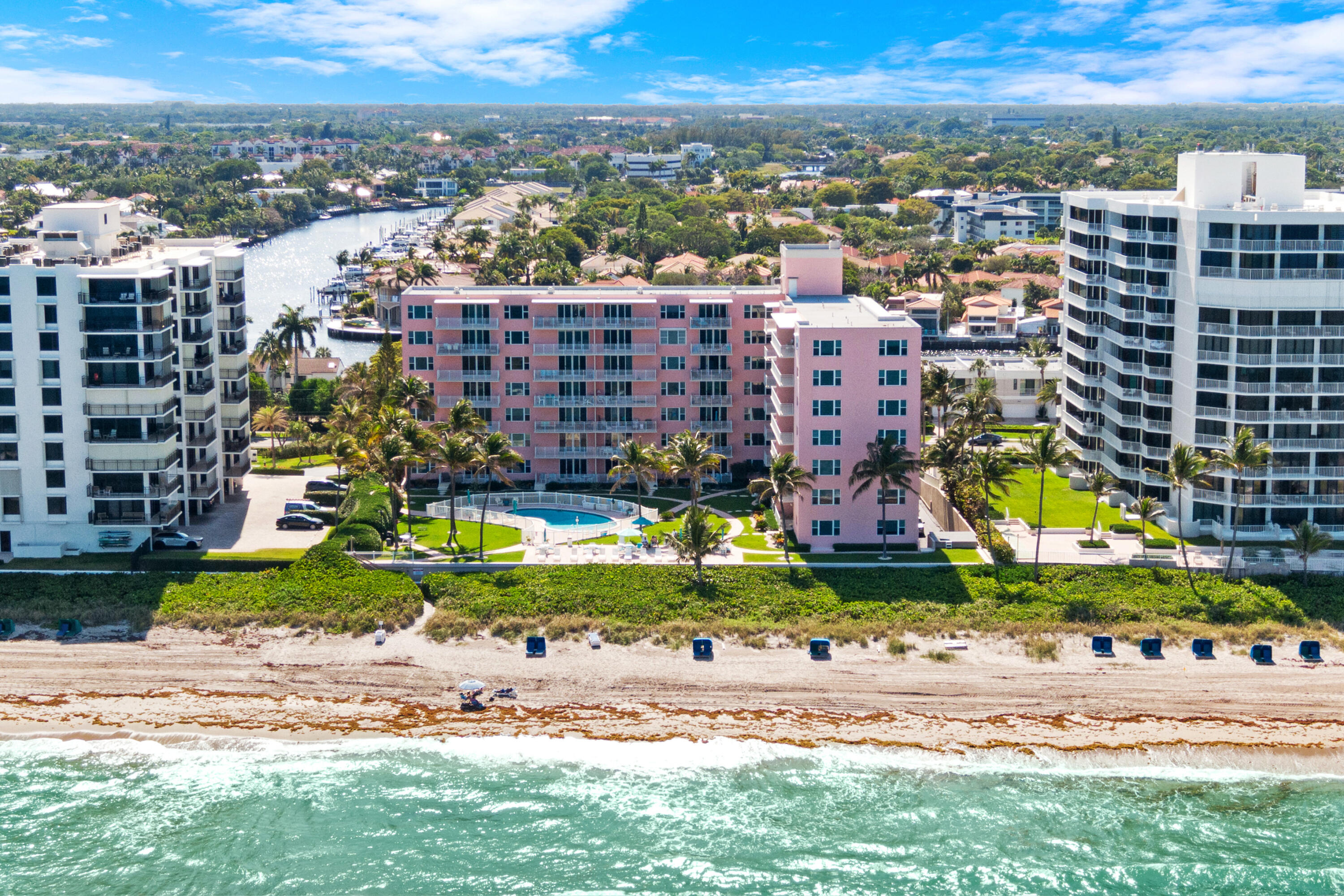 Direct Oceanfront Condo Living in Highland Beach!   Discover this 2-bedroom, 2-bathroom condo (1,330 sq ft) at 2921 S Ocean Boulevard #204 in the intimate Highland Towers community. Built in 1959 and recently remodeled, this east-facing unit offers stunning ocean views from the spacious balcony and large windows throughout.  Enjoy a modern kitchen featuring white cabinetry and stainless steel appliances, plus thoughtful touches like split bedrooms, in-unit laundry, and abundant natural light. The building provides direct beach access, a pool with ocean views and lush landscaping, plus additional amenities such as storage and parking.    This beachfront retreat is perfect for those seeking the ultimate Florida coast