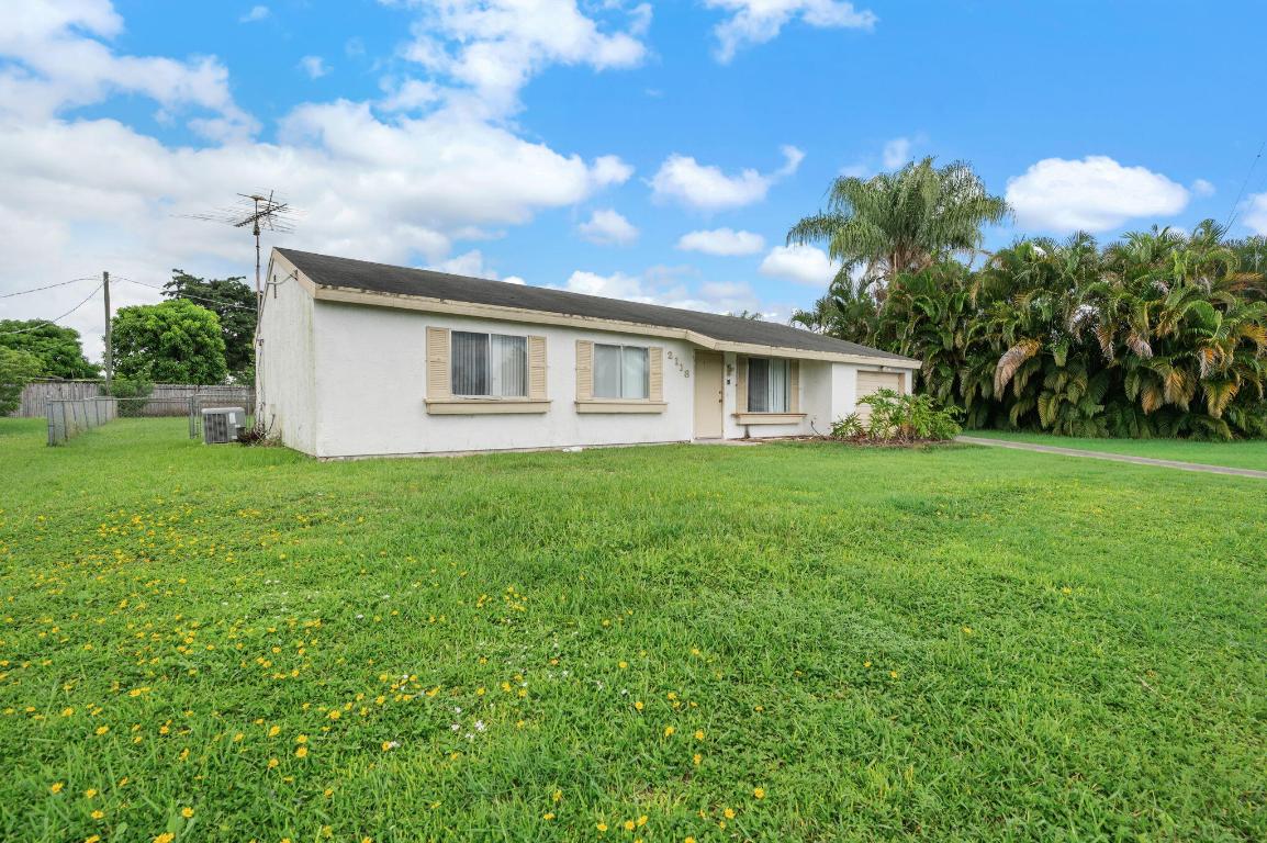 3 bedroom, 2 bath home in Port St. Lucie with 1 car garage. Large fenced yard and screened in porch. AC new in 2020. Large kitchen with dining and opens to living room.