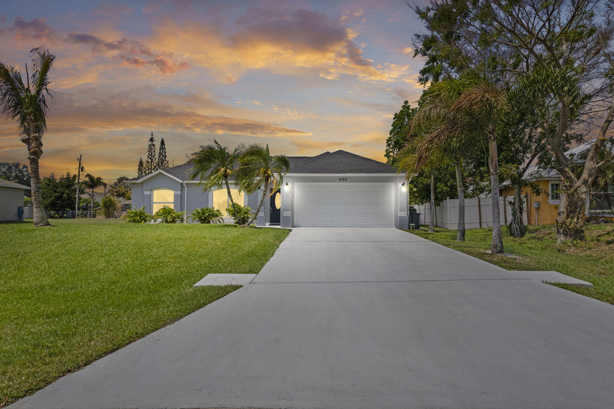 BRAND NEW ROOF (2026)!!! This beautiful home features a brand-new roof and impact windows. The exterior has been freshly painted, new front door and new garage door. COMPLTELY RENOVATED! Popcorn ceiling removed, REMODELED KITCHEN AND BATHROOMS, and open floor concept. The outdoor space includes a large patio, dedicated BBQ area, sprinkler system, and a 10x20 wooden shed. Additional features include a SECURITY ALARM SYSTEM and ONE EXTERIOR CAMERA for added peace of mind. FULLY FURNISHED!!! This home is move-in ready and perfect for both entertaining and comfortable living. 1/2 mile from Becker Rd. 3 miles to Tradition Parkway. 1 mile from Florida Turnpike. GREAT LOCATION AND GREAT SCHOOLS NEARBY!