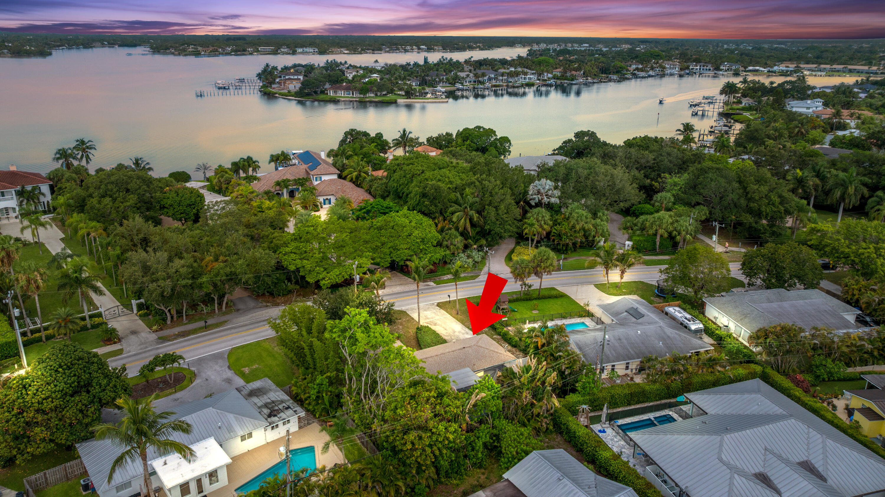 Location, location, location. Welcome to Jupiter in the Pines, one of Jupiter's most established neighborhoods with NO HOA. This CBS home sits on a .22-acre lot in the heart of 33469, walking distance to the Loxahatchee River, top-rated Jupiter A-rated schools, and some of the best waterfront dining in Palm Beach County. Priced at land value. Bring your contractor and renovate to your taste, or tear it down and build new. Spec homes are going up throughout the neighborhood. Get in now before prices soar.  This is the entry point into a neighborhood that is actively repricing. Do not miss it.