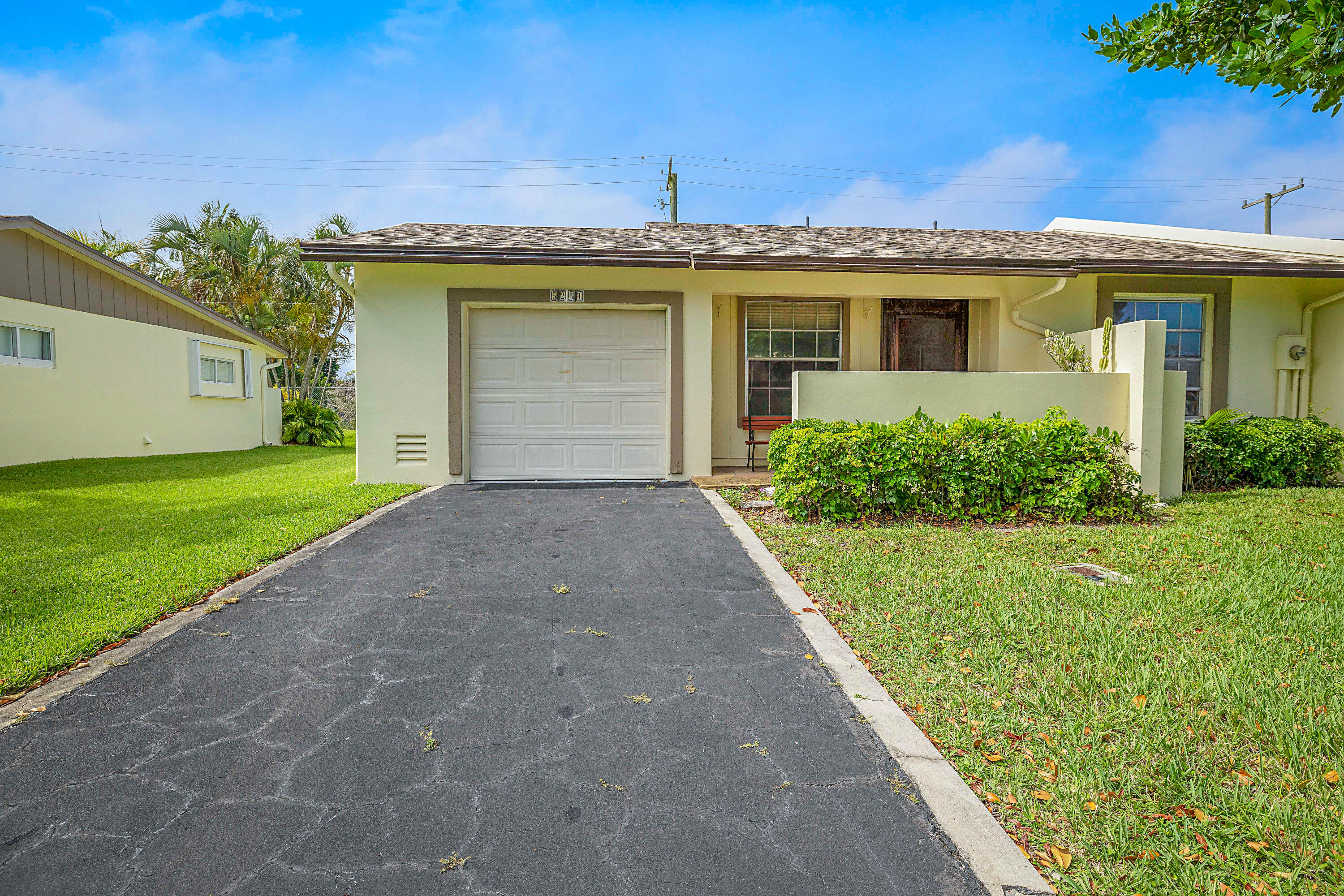 Welcome to easy South Florida living in the highly desirable Copperleaf section of Las Verdes, one of Delray Beach's most sought-after 55+ communities! This charming 2-bedroom, 2-bath end-unit villa with a 1-car garage offers the perfect combination of comfort, privacy, and convenience. Filled with natural light thanks to its desirable end-unit location, this well-maintained home features a spacious floor plan with generously sized living areas and partially updated bathrooms. The remainder of the home has been lovingly cared for and is move-in ready, offering the perfect opportunity to enjoy as-is or personalize to your own taste over time. This unit has a new roof and AC installed within the last 2 years. Enjoy the peace of mind and relaxed lifestyle that Las Verdes is known for,  with beautifully maintained grounds and an exceptional array of amenities. Residents enjoy a vibrant social atmosphere with a clubhouse, resort-style pool and spa, tennis courts, pickleball, fitness center, walking paths, and numerous clubs and activities designed to keep you as active and engaged as you desire. Ideally located just minutes from downtown Delray Beach's renowned Atlantic Avenue, beautiful beaches, shopping, dining, entertainment, and medical facilities, this home offers everything you need to enjoy the Florida lifestyle you've been dreaming of. Don't miss this opportunity to own a rarely available end-unit villa in one of Delray Beach's most popular active adult communities!