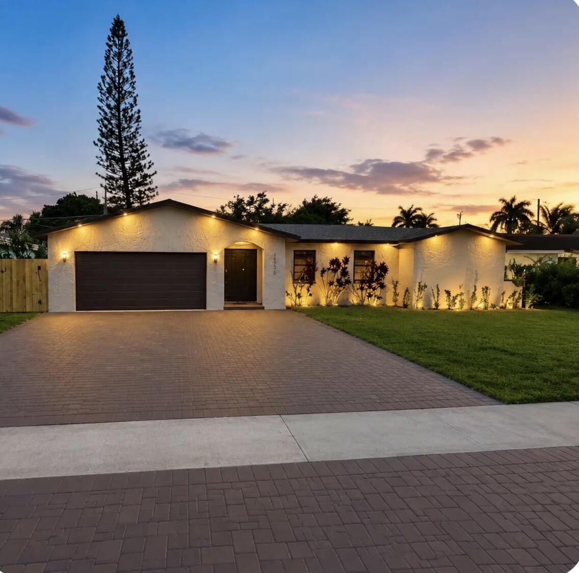 Experience South Florida living in this impeccably maintained, fully furnished residence, where contemporary design meets exceptional comfort. Thoughtfully designed throughout, this move-in-ready home features a bright, open-concept floor plan enhanced by luxury flooring, designer finishes, a custom wood slat accent wall, and beautifully appointed spa-inspired bathrooms. The gourmet kitchen is the centerpiece of the home, showcasing a striking waterfall-edge island, sleek custom cabinetry, premium contemporary fixtures, and brand-new stainless steel appliances, perfectly designed for both everyday living and effortless entertaining. Additional highlights include a newer roof, newer air conditioning system, and impact-resistant windows, providing lasting value and peace of mind.  Step outside to your private backyard retreat, complete with a sparkling swimming pool, an expansive paver patio, newly installed privacy fencing, fresh professional landscaping, and elegant exterior lighting. This exceptional outdoor living space offers the ideal setting for relaxing, entertaining, and enjoying Florida's year-round sunshine.  Ideally situated in a central location, the property is just 9 minutes from Sawgrass Mills Mall and only 7 minutes from the Sawgrass Expressway, providing convenient access to premier shopping, dining, entertainment, and major commuter routes. Combining sophisticated design, quality upgrades, and an outstanding location, this turnkey home presents a rare opportunity to enjoy luxury living at is finest.